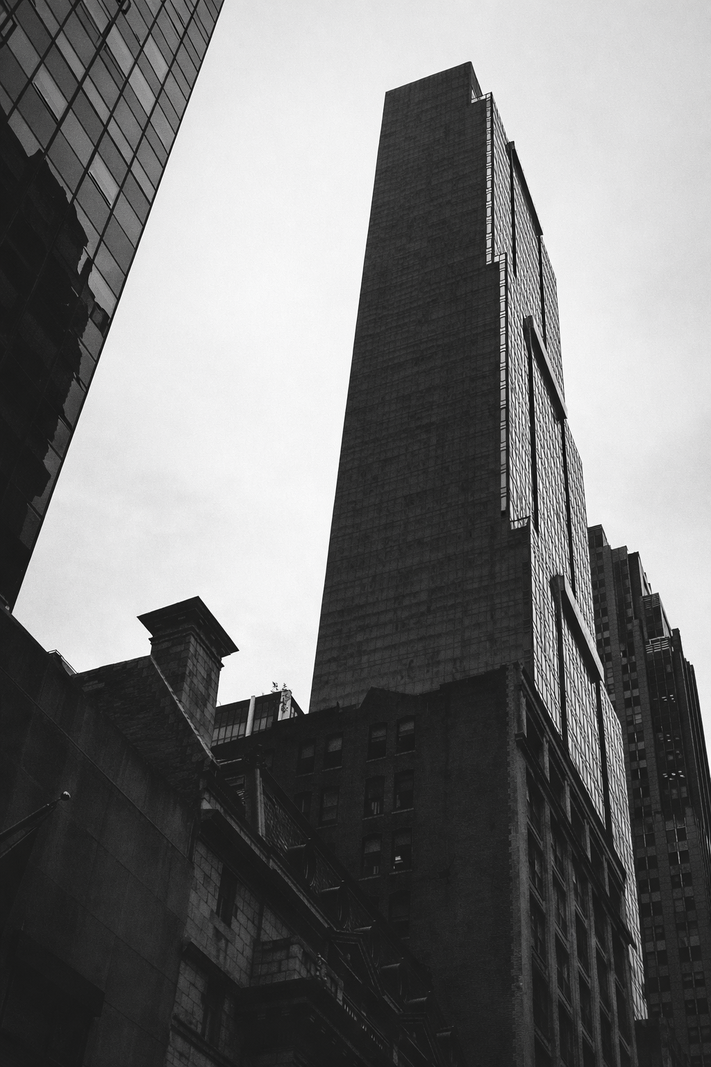 "Rising Through"
The building cuts upward through the frame, uninterrupted and absolute. What we build doesn’t just stand—it asserts itself.