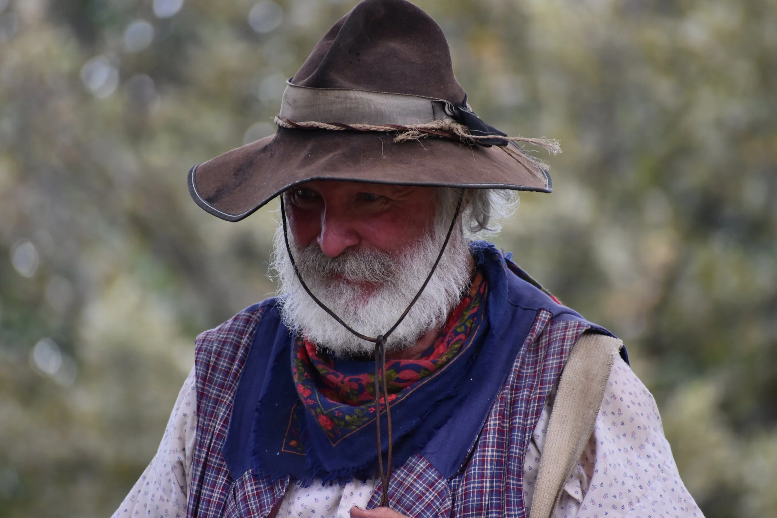 "Worn Identity"
He stands in what he carries, shaped by time and place. The moment feels lived, not chosen.