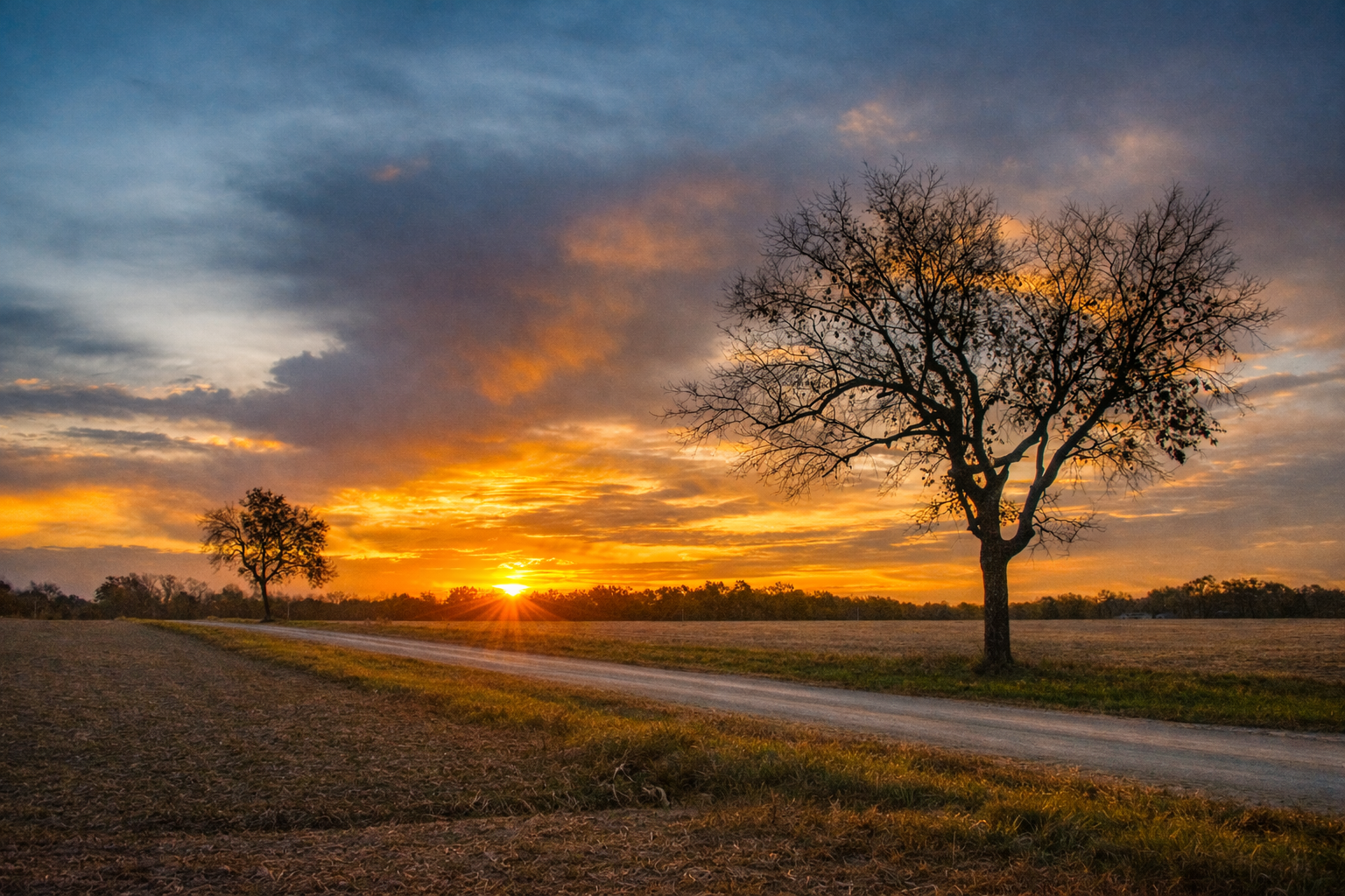 "Last Line"
The road runs alongside the final light, holding it just a moment longer. What continues forward does so without the day.