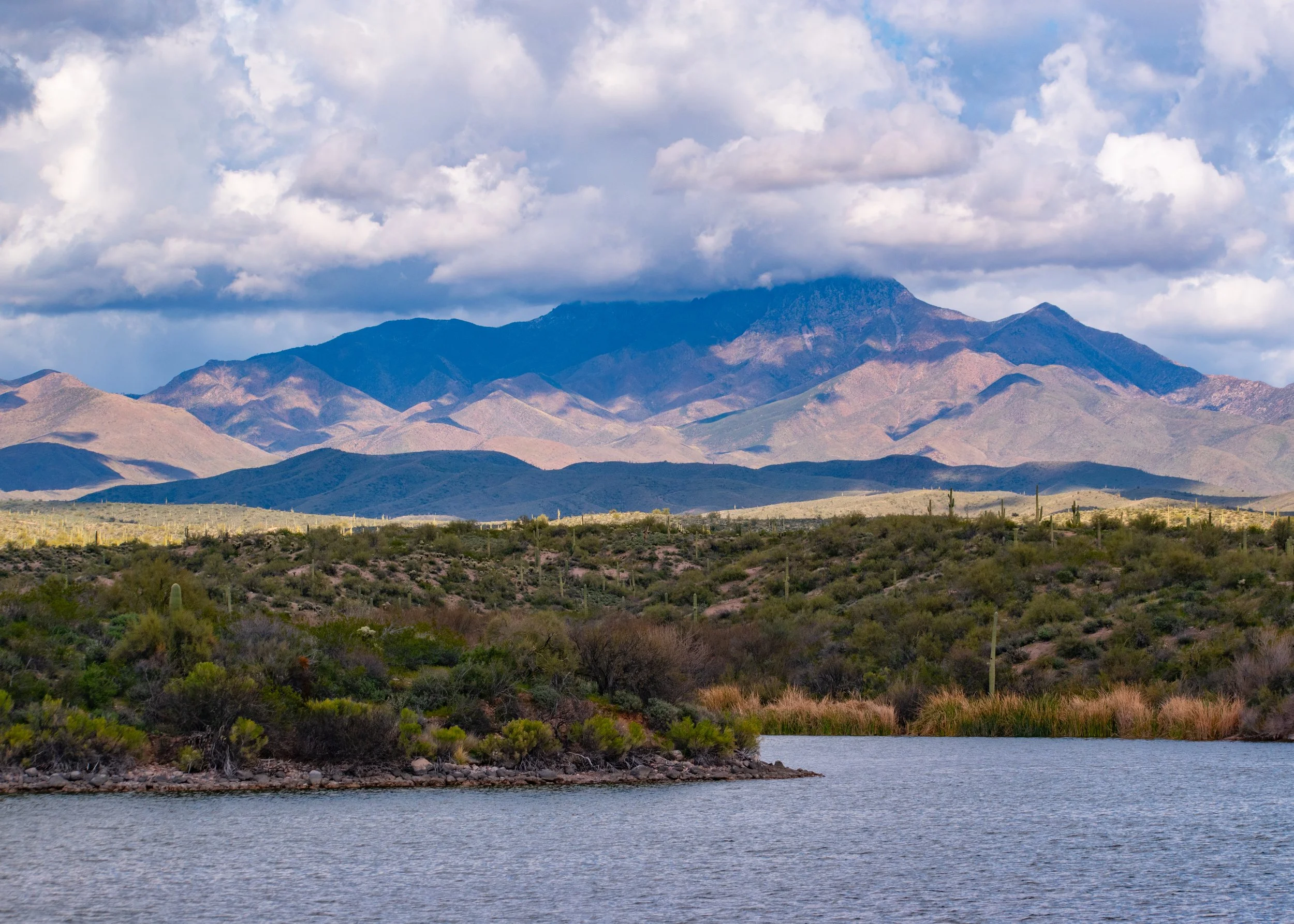 "Beyond Reach"
The mountains sit across the water, present but separated. Elevation creates distance as much as it creates height.