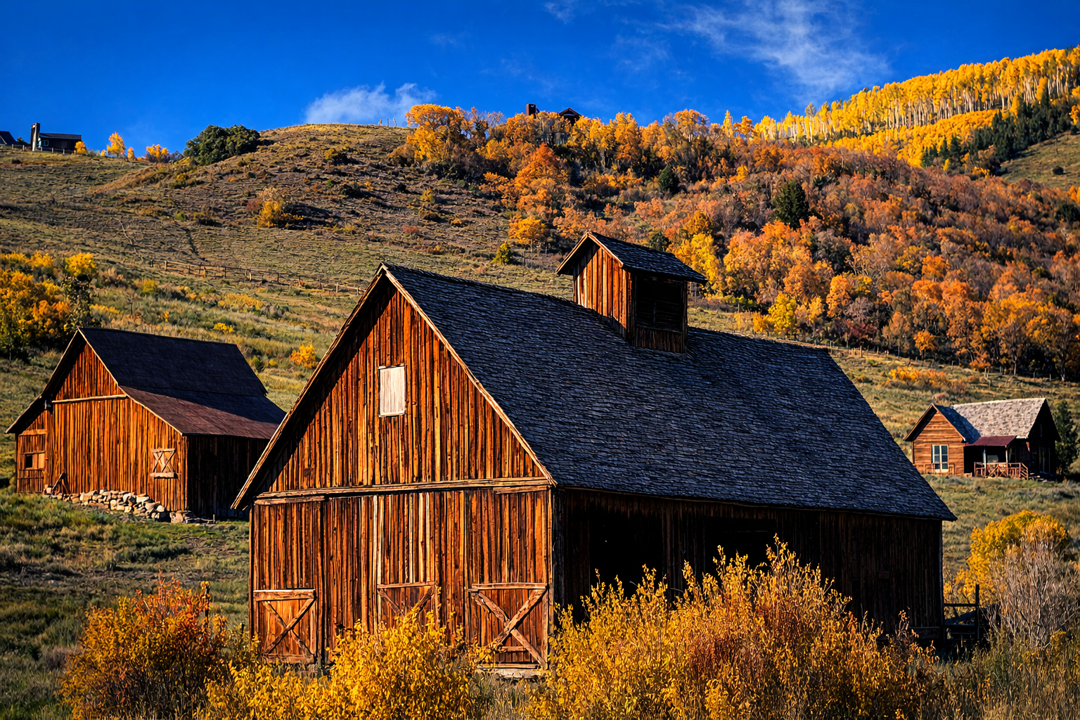 "Seasonal Memory"
Structures rest within the changing hills, shaped by time and use. What stands here has endured more than one season.