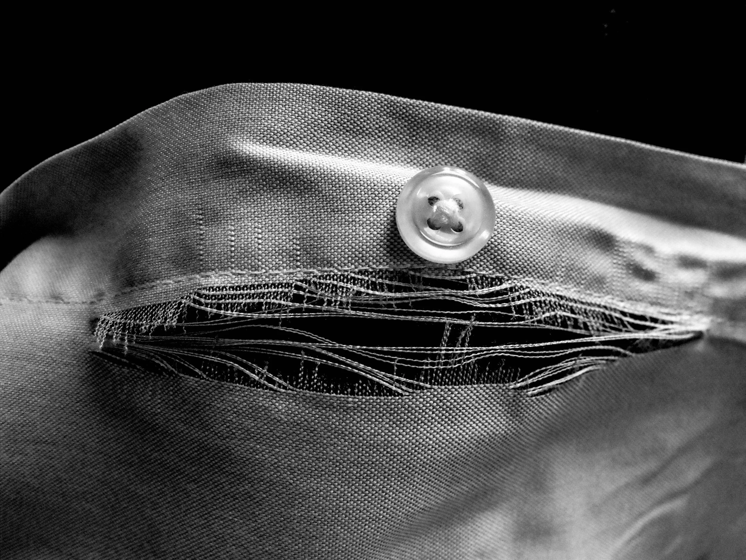 "Unraveling"
The fabric gives way slowly, thread by thread. What held together begins to remember how to fall apart.