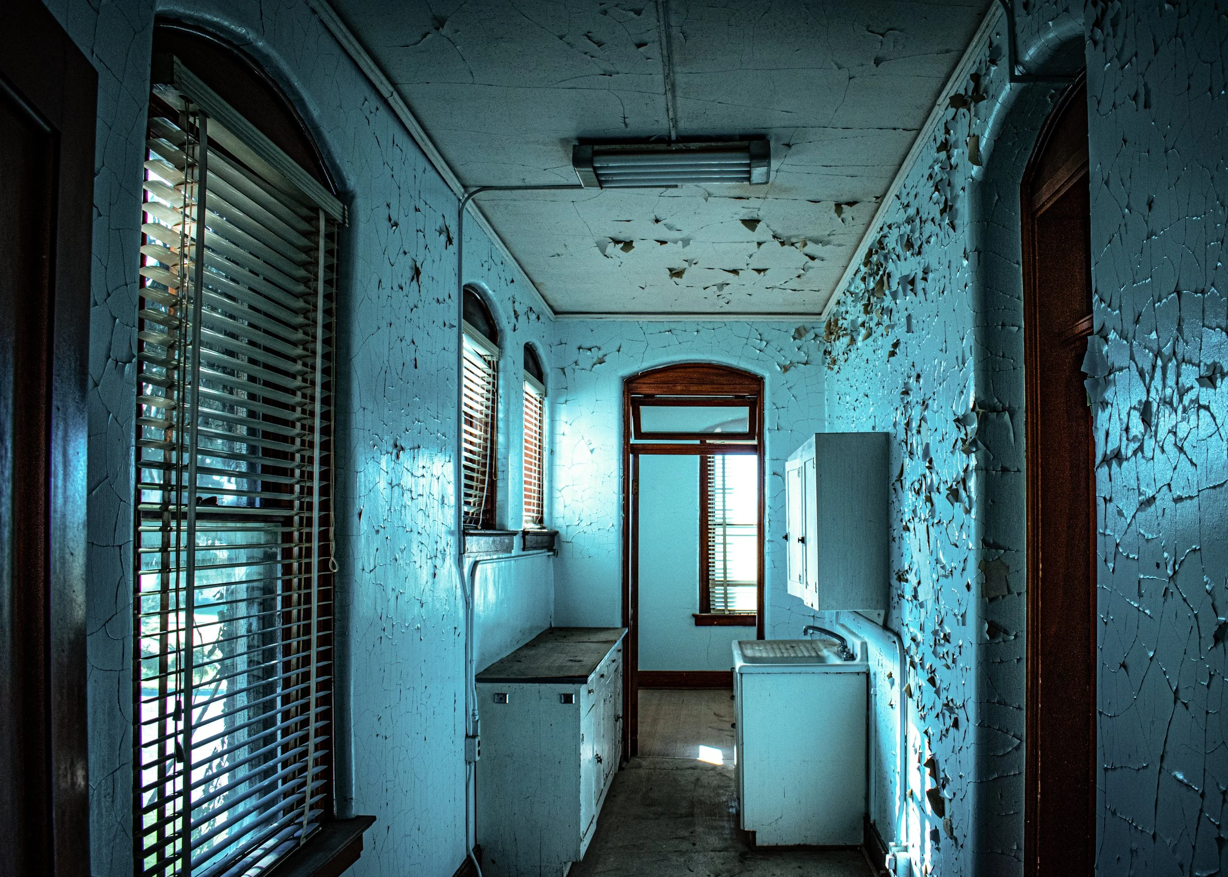 "Passed Through"
The hallway holds the traces of those who moved within it. The space remains—but what filled it has gone.