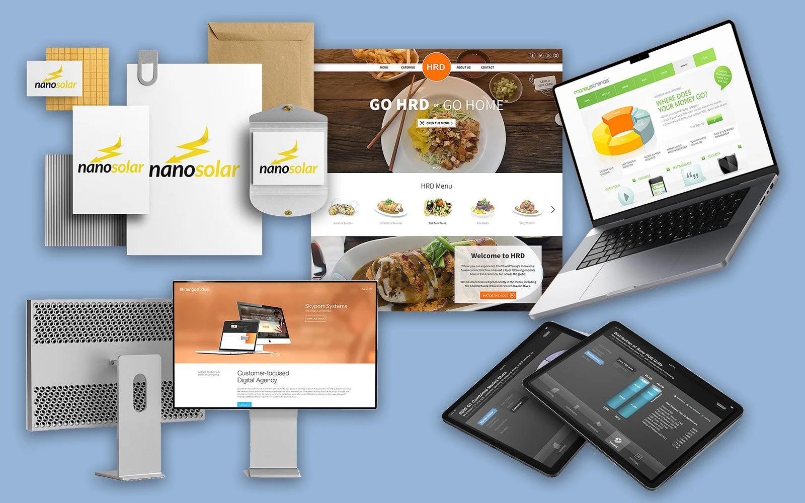 A digital collage of various business branding and technology items, including branded nano solar chips, a brown envelope, multiple computer screens displaying websites and graphs, tablets, and printed materials, laid out against a light blue background.