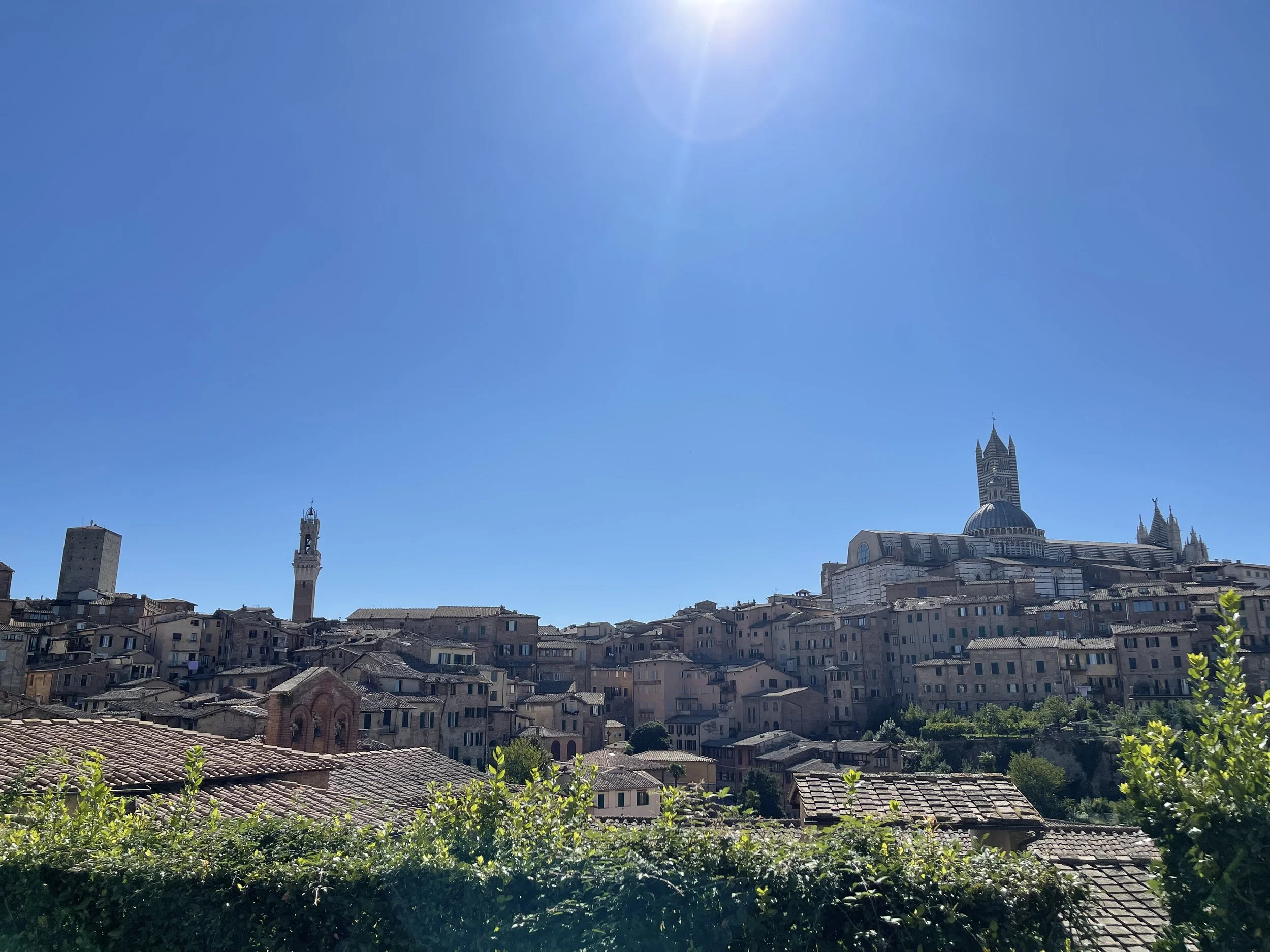 Siena Travel Guide: Medieval Beauty &amp; One of Italy’s Most Stunning Squares