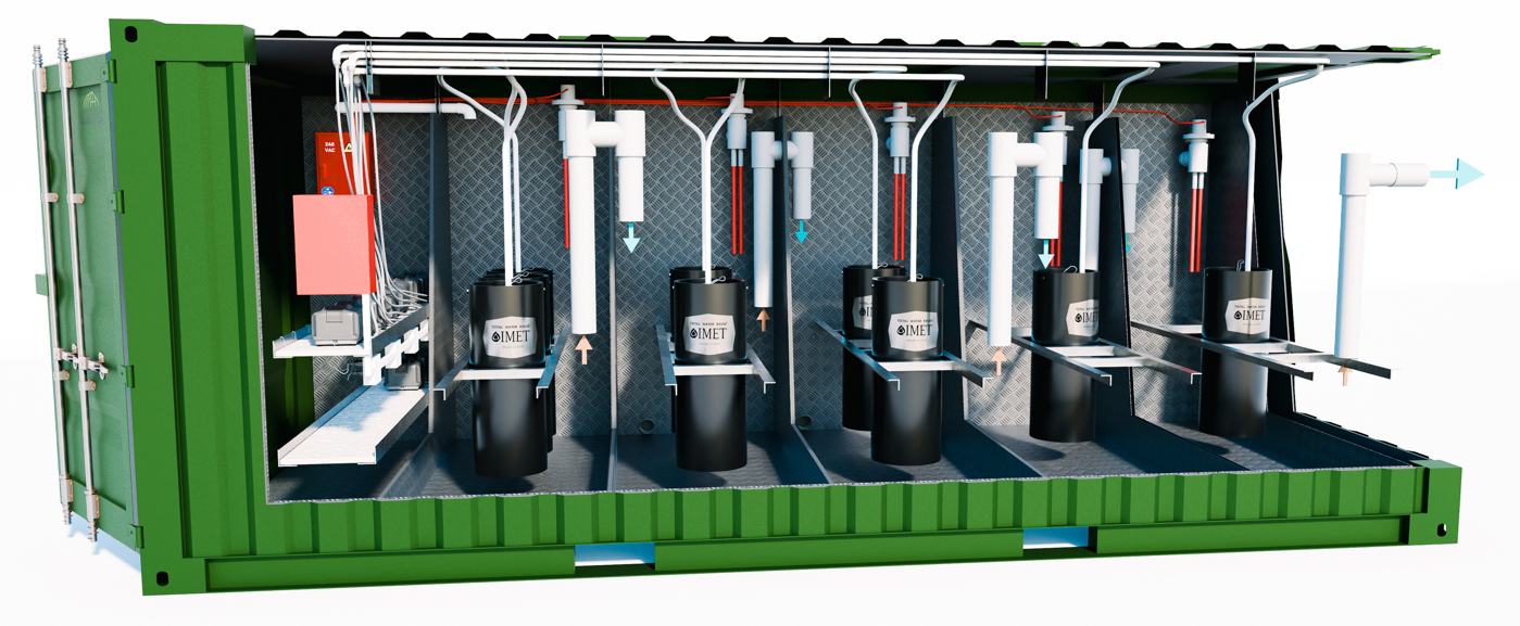 Interior of a green modular water treatment system with black tanks, white piping, and control components.