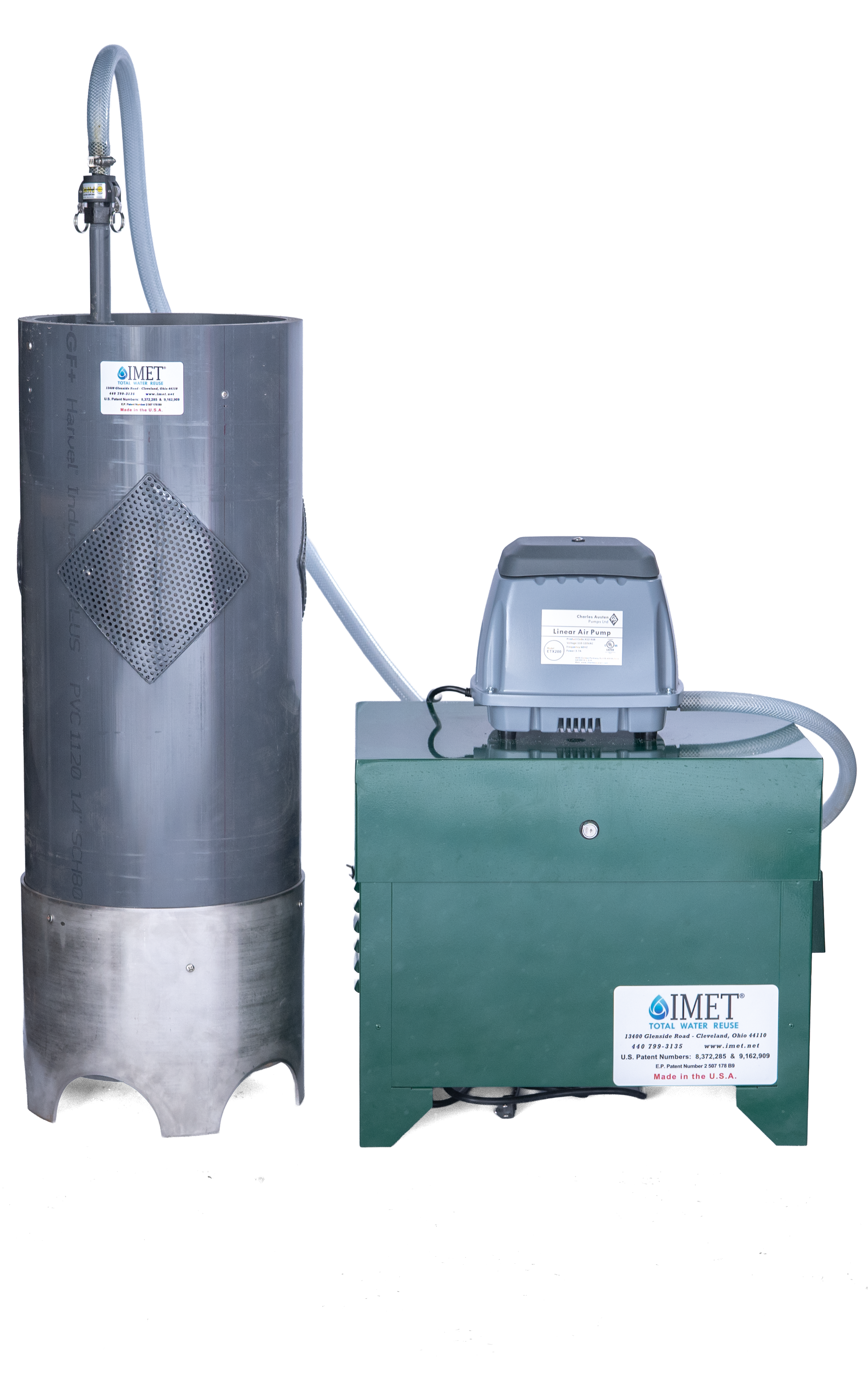 Modular wastewater treatment technology. A tall, silver cylindrical module connected to a green rectangular unit with a gray pump on top, labeled IMET Total Water Reuse.