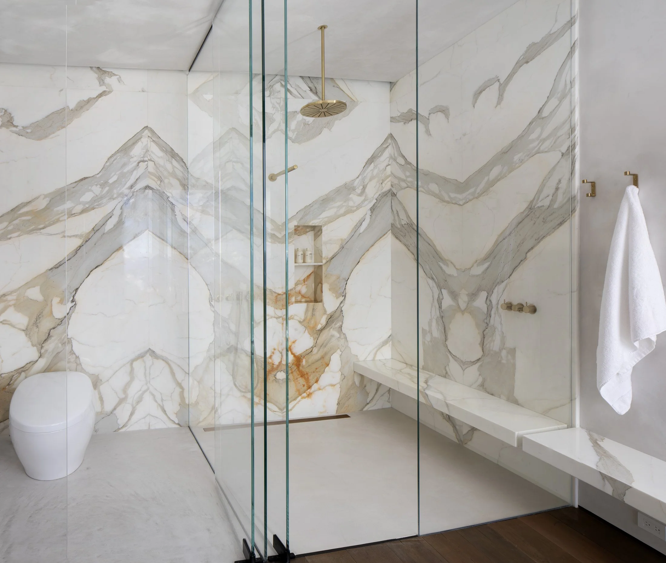 ASH-09-master-shower-bookmatched-marble.jpg