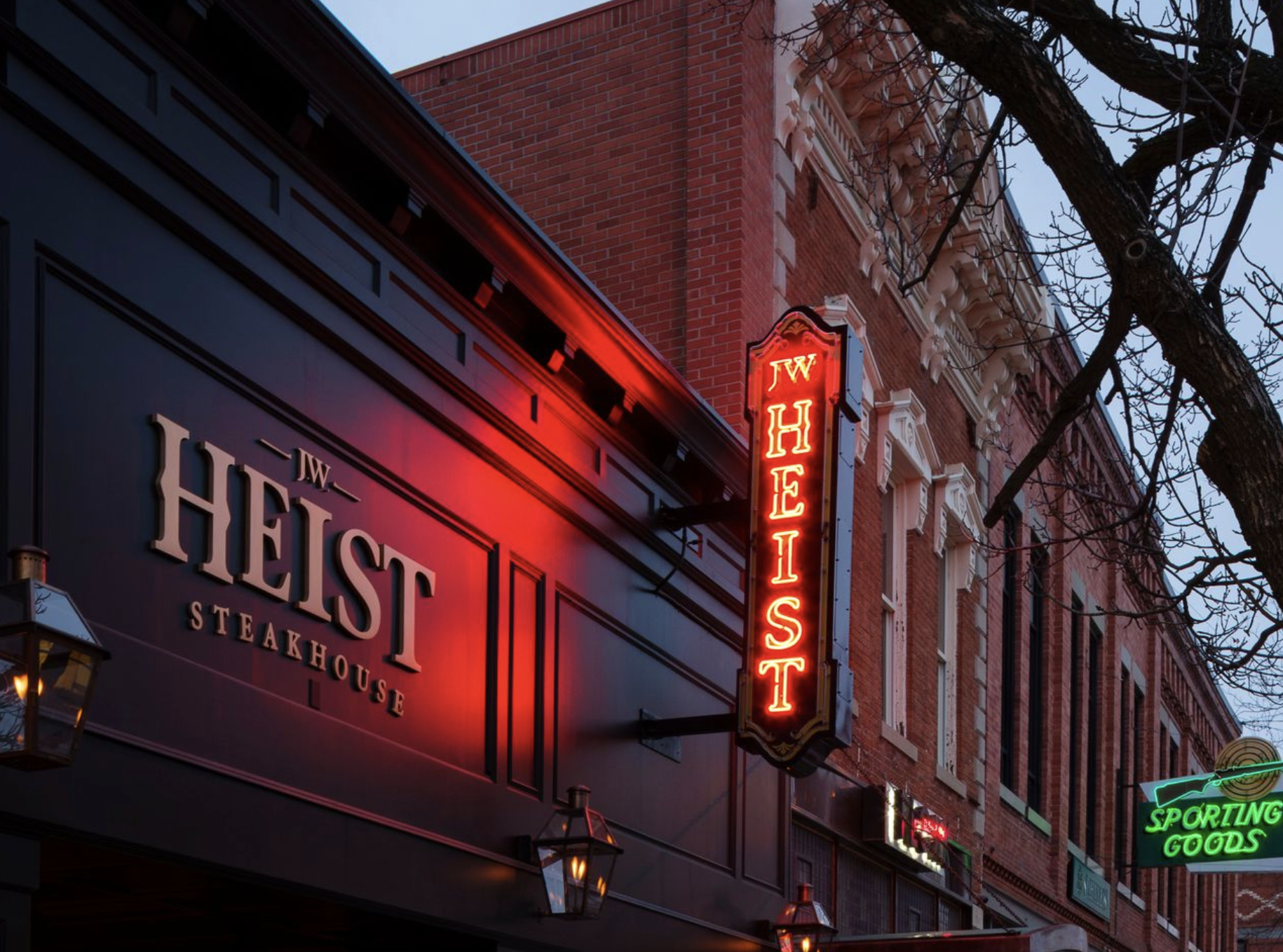 JWH-24-JW-Heist-exterior-neon-sign-evening.png