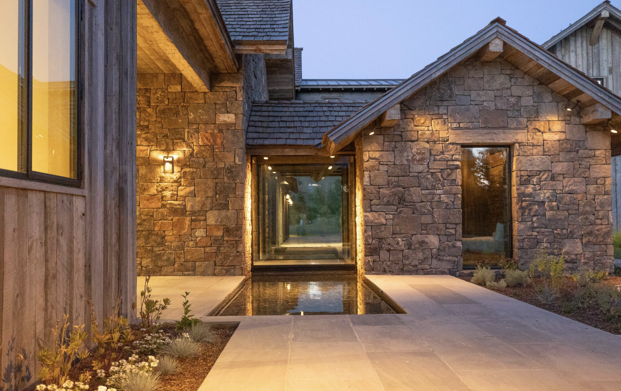 MP-05-front-entry-reflecting-pool-evening.png