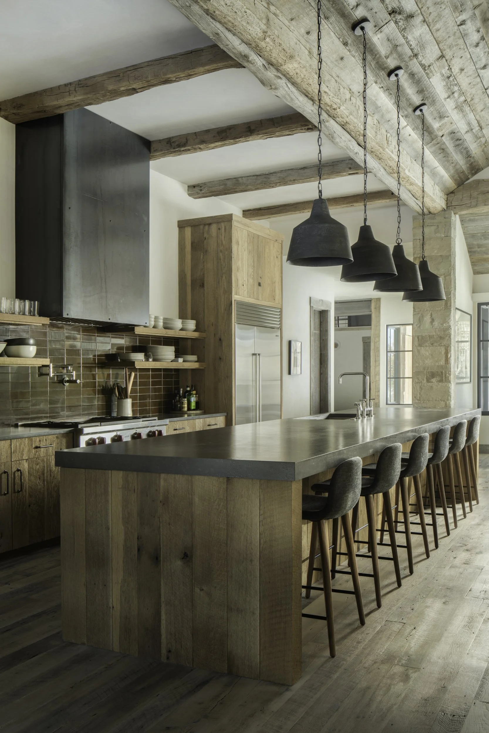 Mid century modern Galley kitchen with reclaimed wood cabinetry in Big Sky Montana
