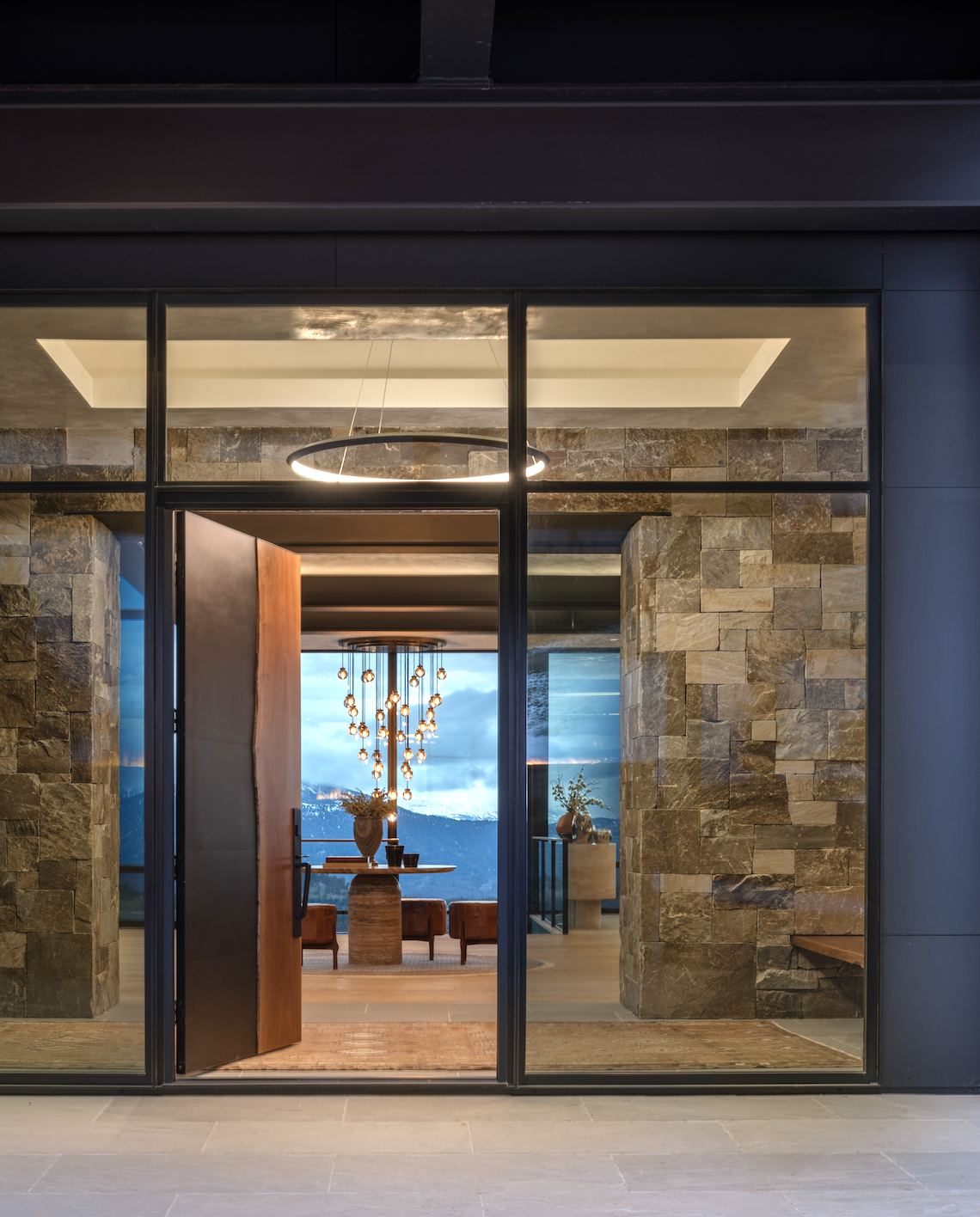 PL-29-glass-entry-stone-walls.png