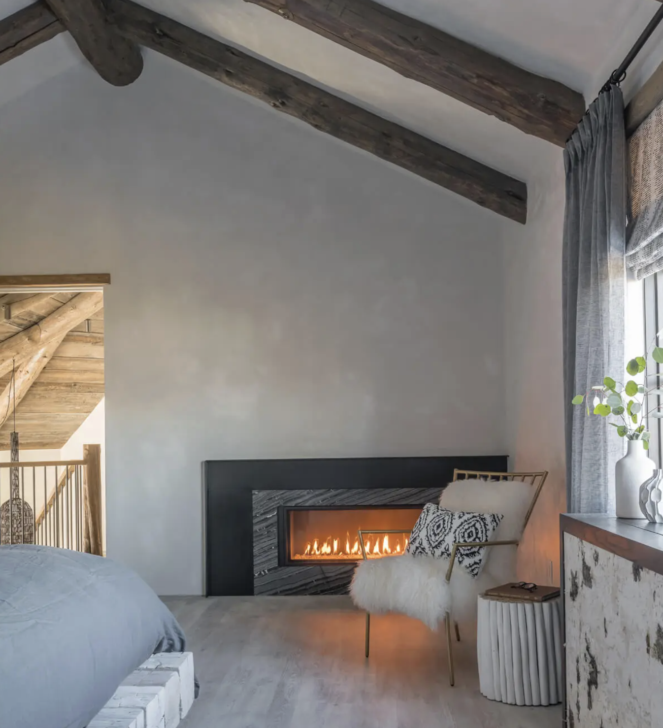 RN-13-rustic-nuevo-bedroom-fireplace-lohss.png