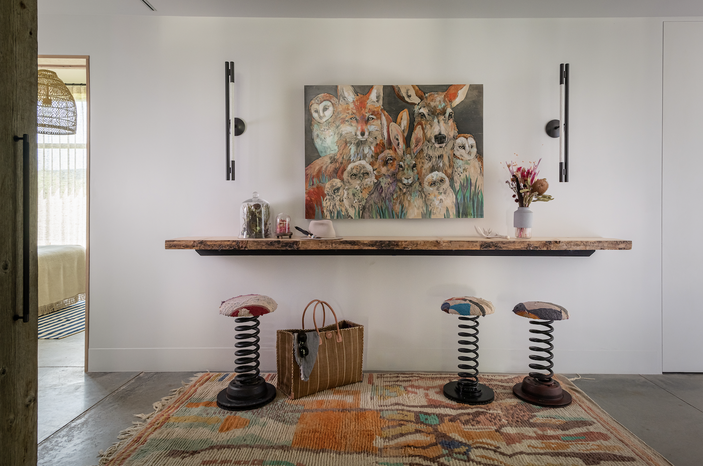 Hallway detail with shelf and artwork