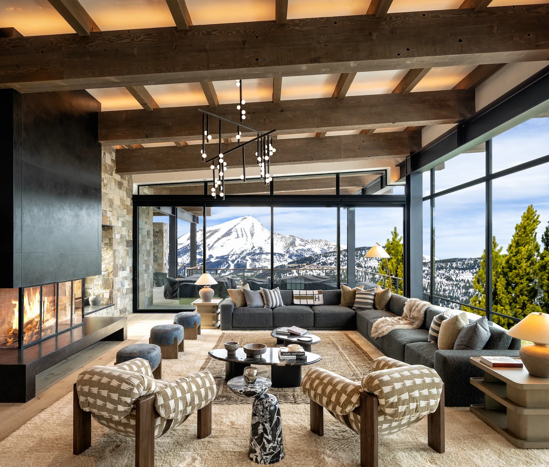 PL-35-yellowstone-club-great-room-fireplace-lone-peak-view-zakara.webp