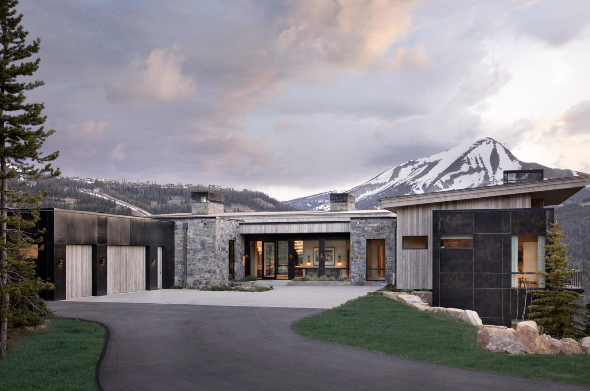 HW-02-covered-entry-stone-glass-big-sky.png