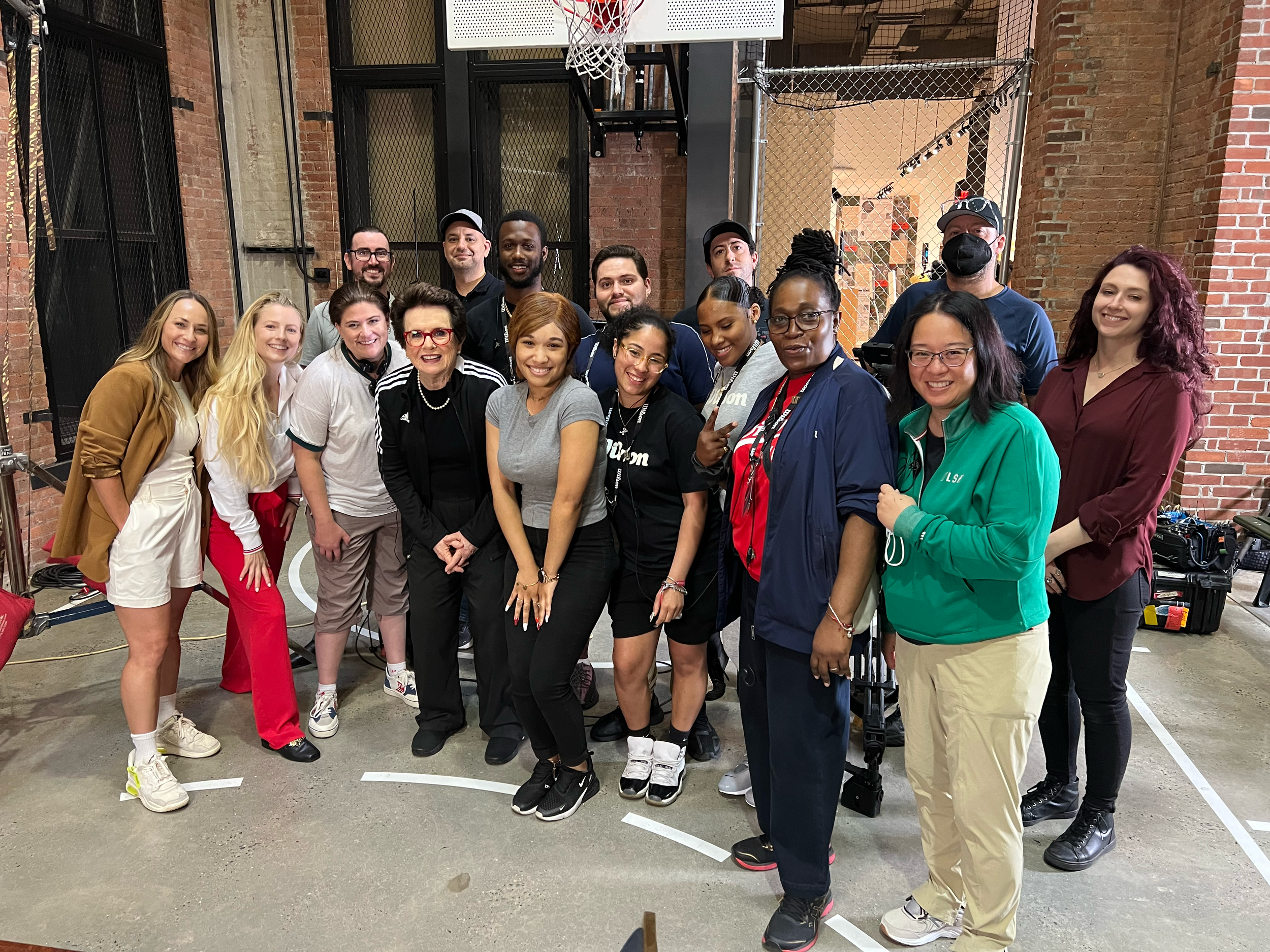 A photo of Katie and Team Wilson with Billie Jean King