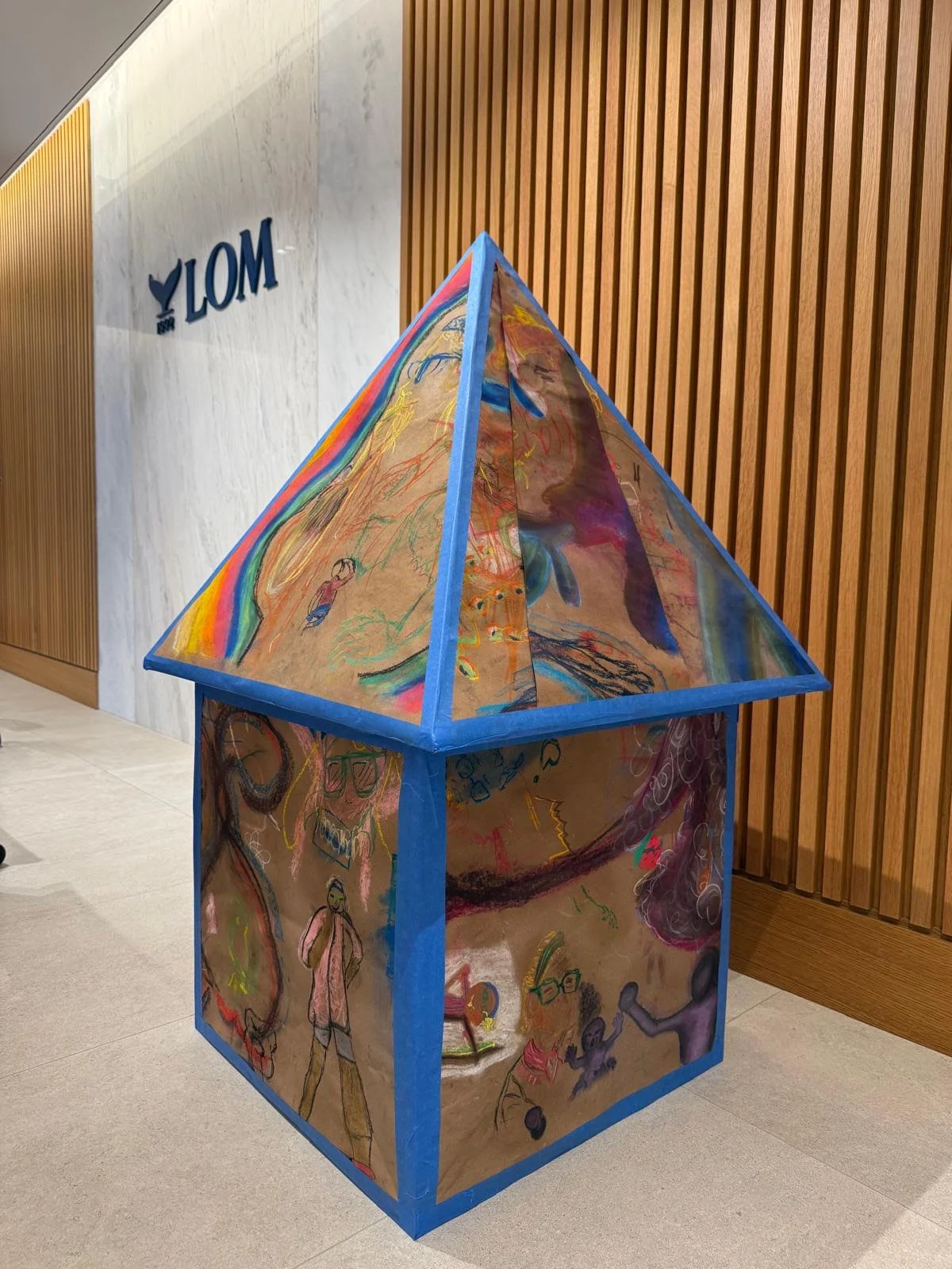 The Bermuda house — students' chalk drawings assembled into a large-scale sculptural structure