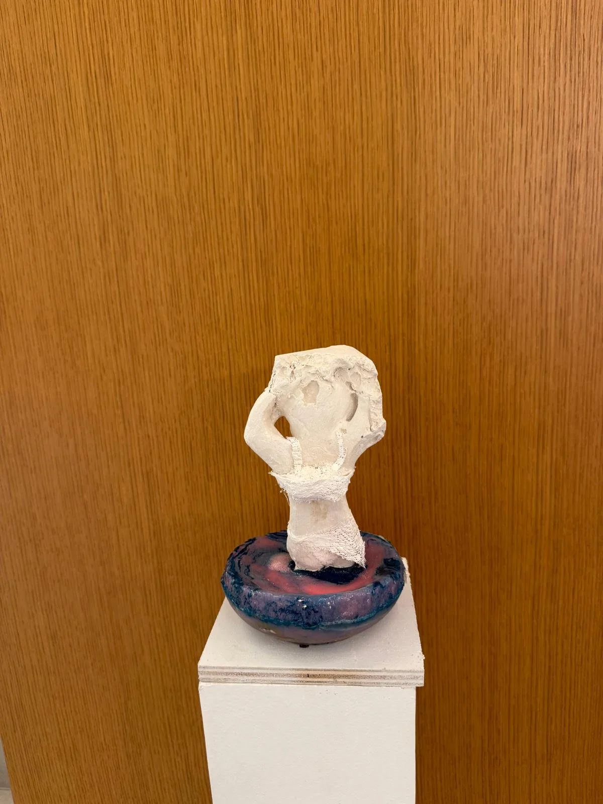 “Caring the weight of the world” - Plaster figure on resin base