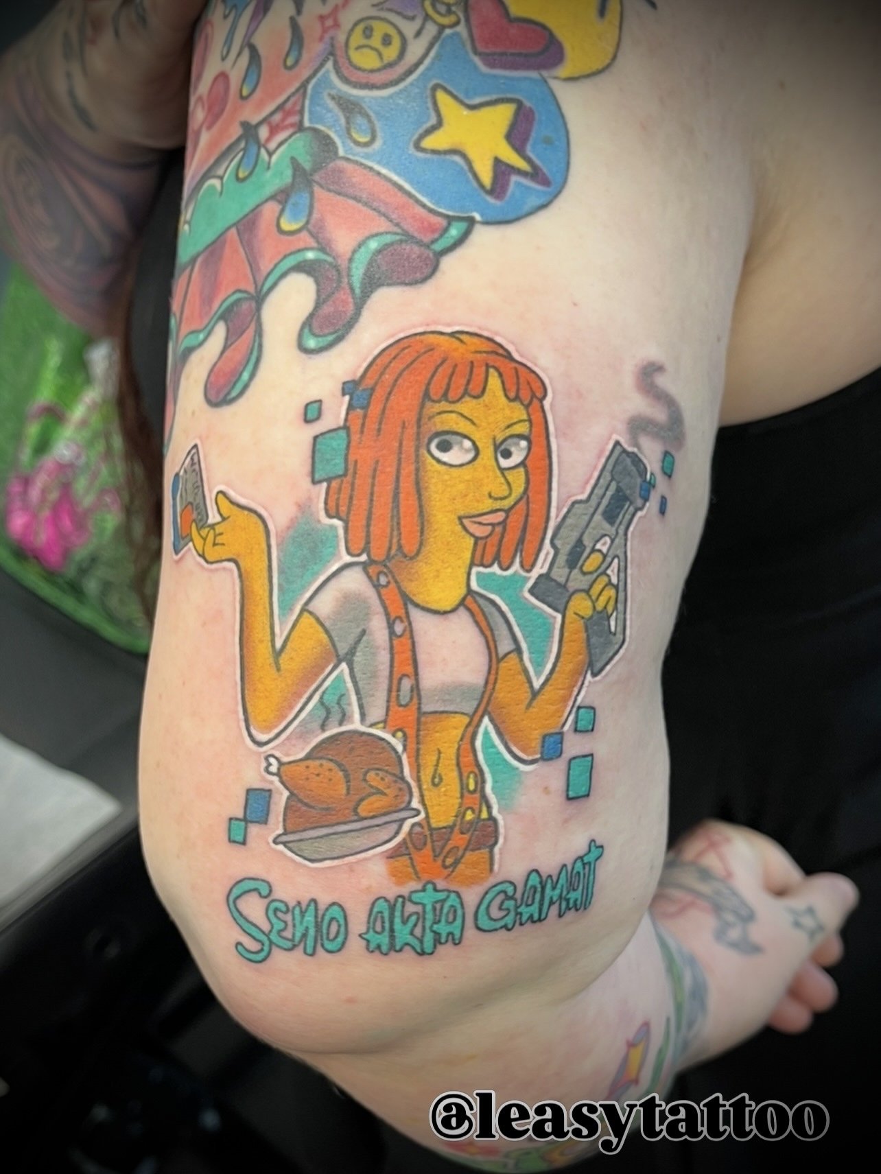Simpsons Fifth Element colour cartoon tattoo by Leasy tattoo newcastle NSW