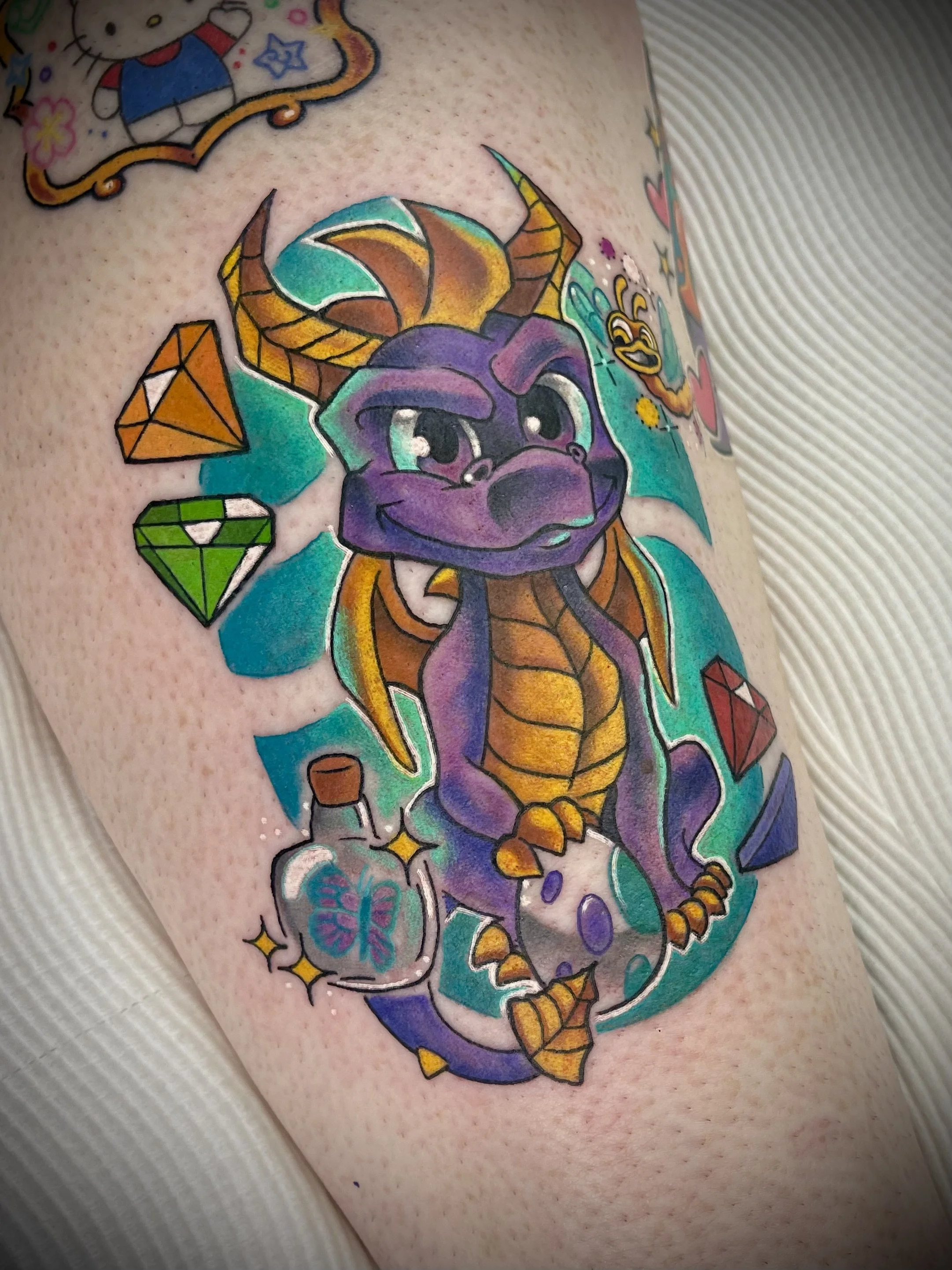 Spyro dragon game colour cartoon tattoo designed by Leasy Tattoo Newcastle