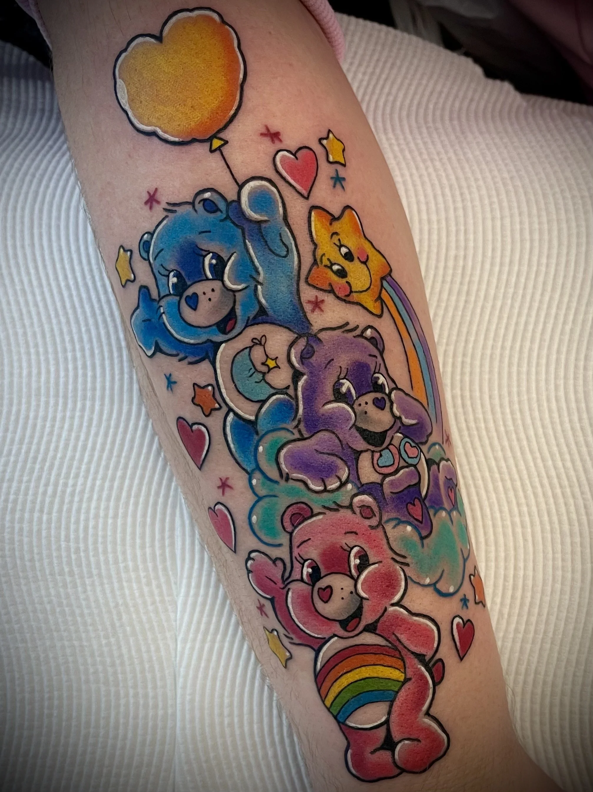 Care Bear colour cartoon tattoo by Leasy tattoo newcastle NSW