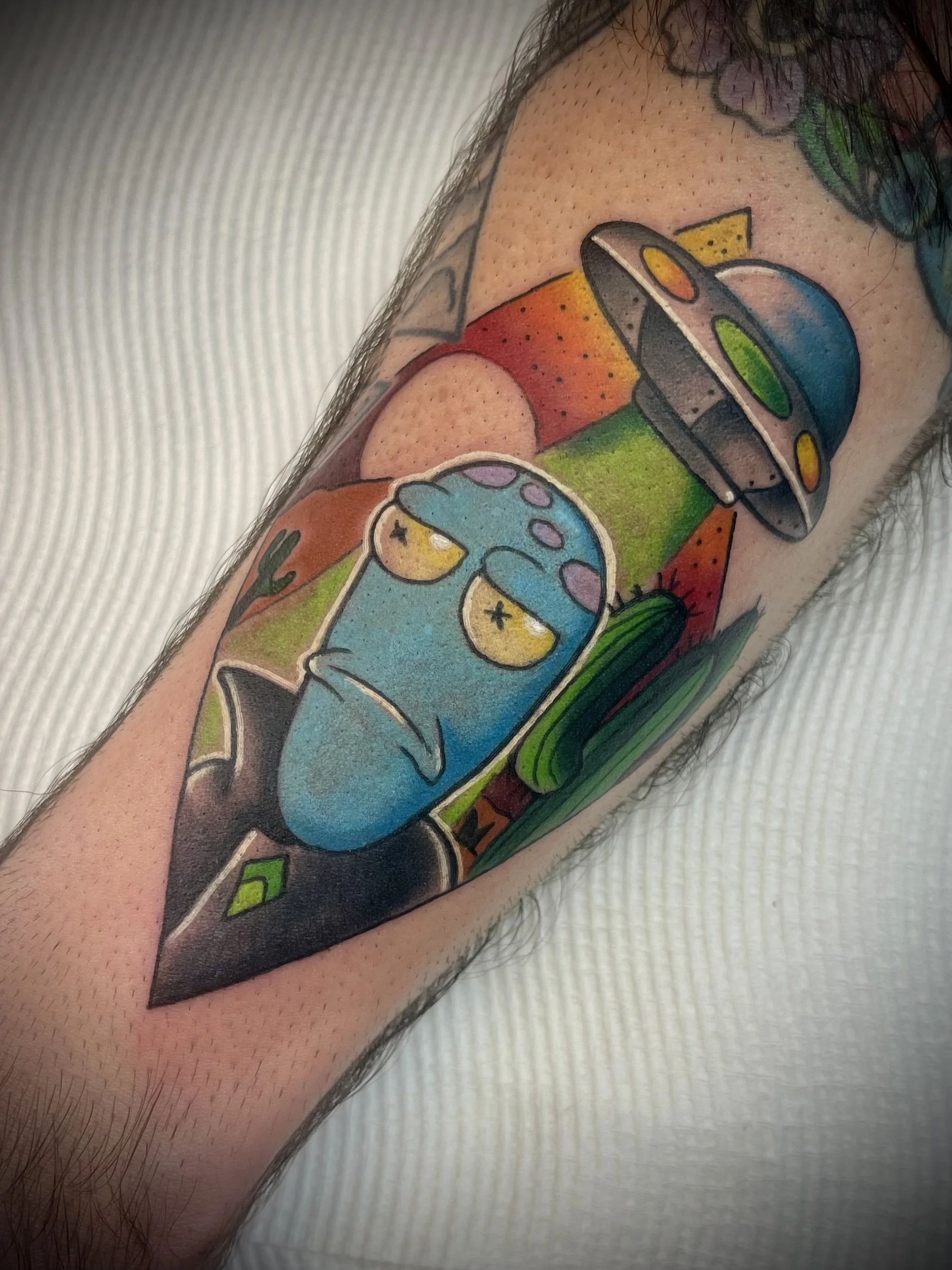 Solar opposites korvo colour cartoon tattoo by Leasy Tattoo newcastle nsw