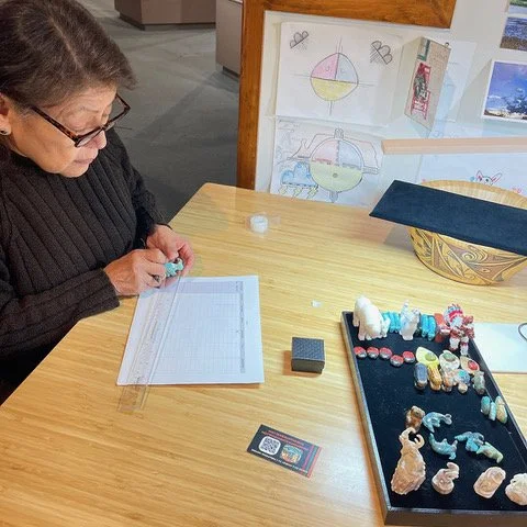Abby Quam evaluating items for Z-ART