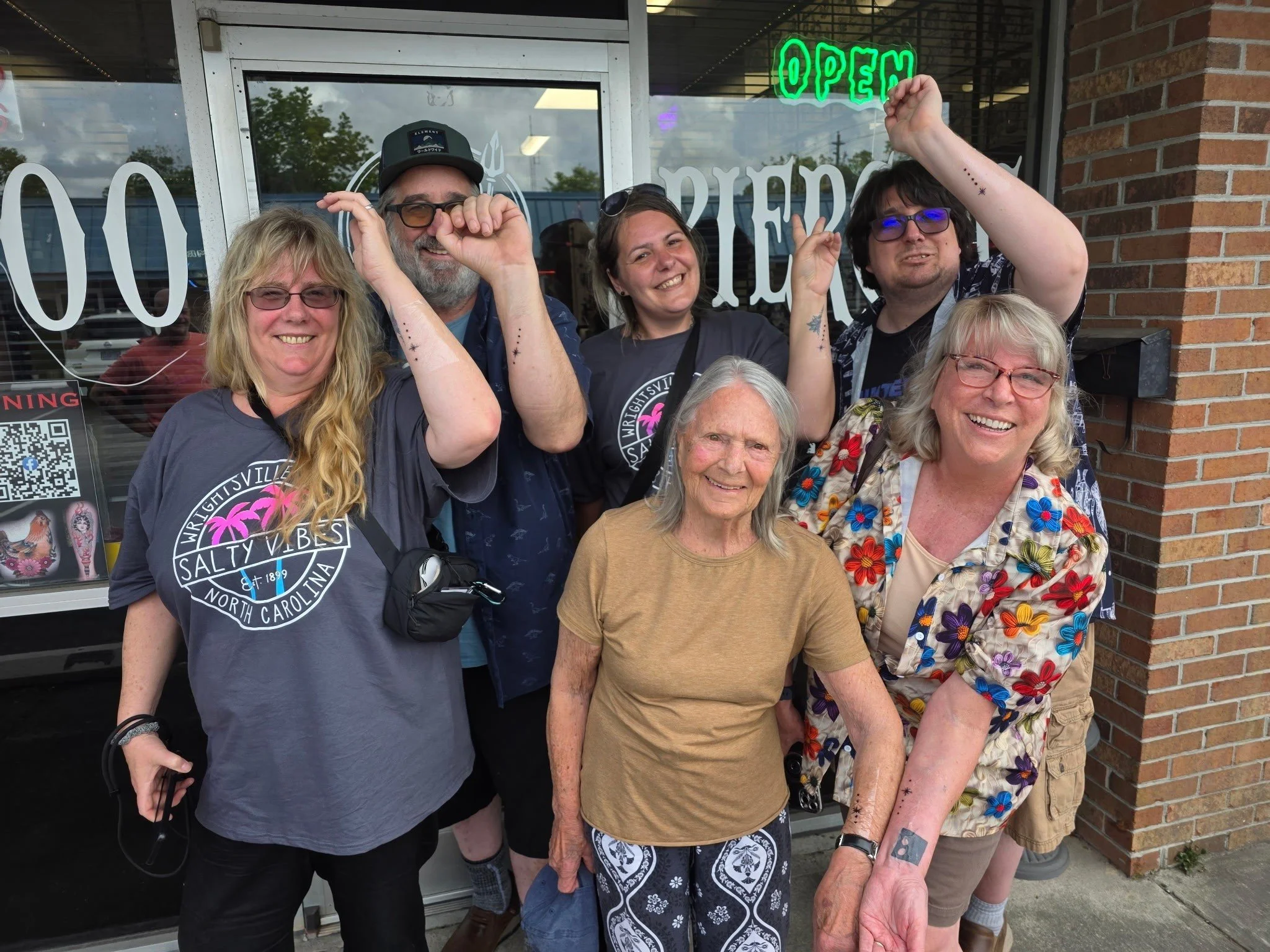 "Family of six came in. 4 here from GERMANY. All got matching tattoos signifying their place in the family. When I took the picture I said 123 say "Wasser"!!"

- Josh @thundertatz 

 #WilmingtonTattooAndPiercing #WilmingtonNC #NCT