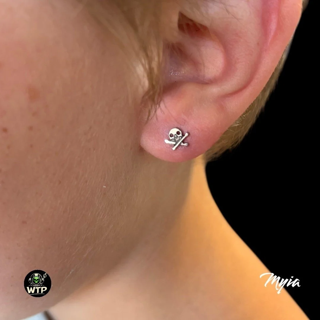 First ear piercing with our titanium skull crossbone top 

Myia @_prettypiercer 

.
.
 #WilmingtonTattooAndPiercing #WilmingtonNC #WilmingtonNCPiercing #WilmingtonPiercing #NCPiercer #910Piercing #CapeFearPiercing #BodyPiercing #ProfessionalPiercer #