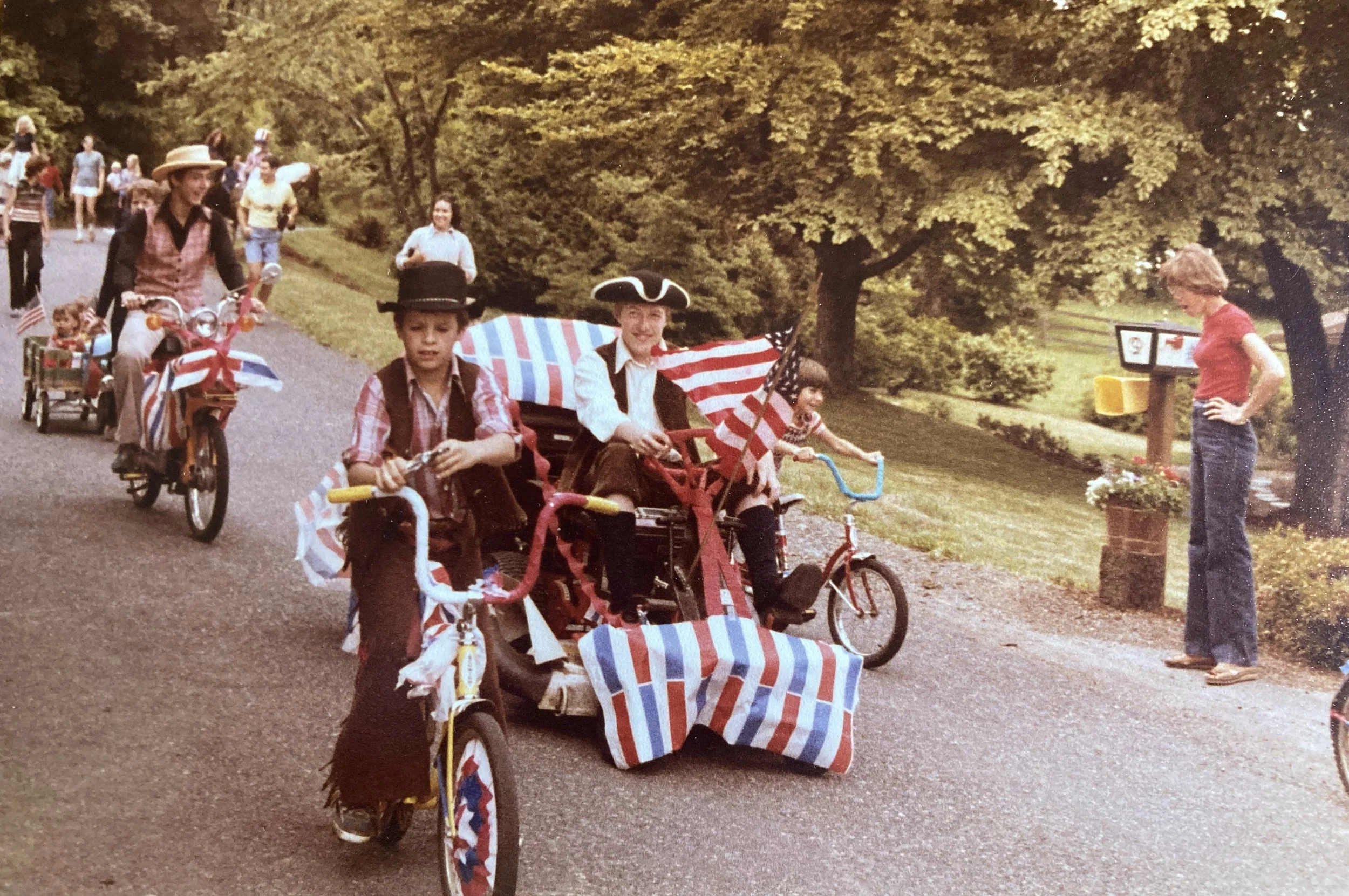 Driving our lawnmower on our street parade for the 1976 Bicentennial celebration.