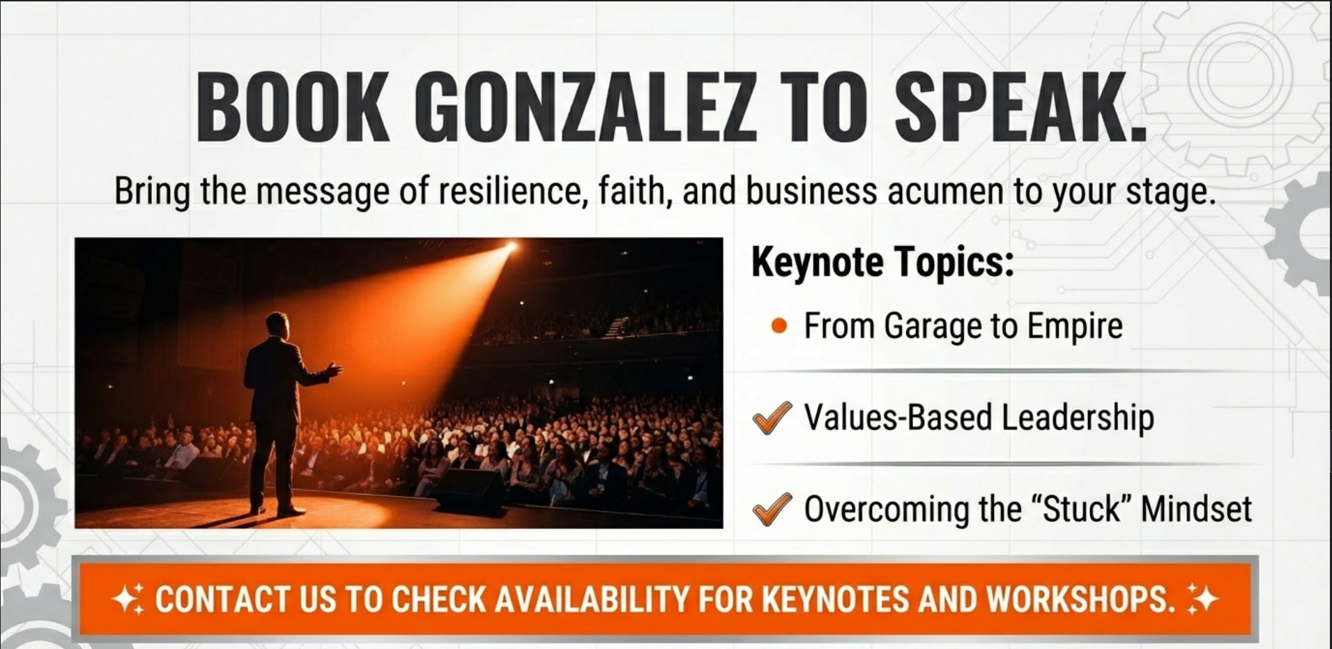 A speaker on stage addressing a large audience in a dark auditorium, with a spotlight illuminating the speaker and a screen behind them.