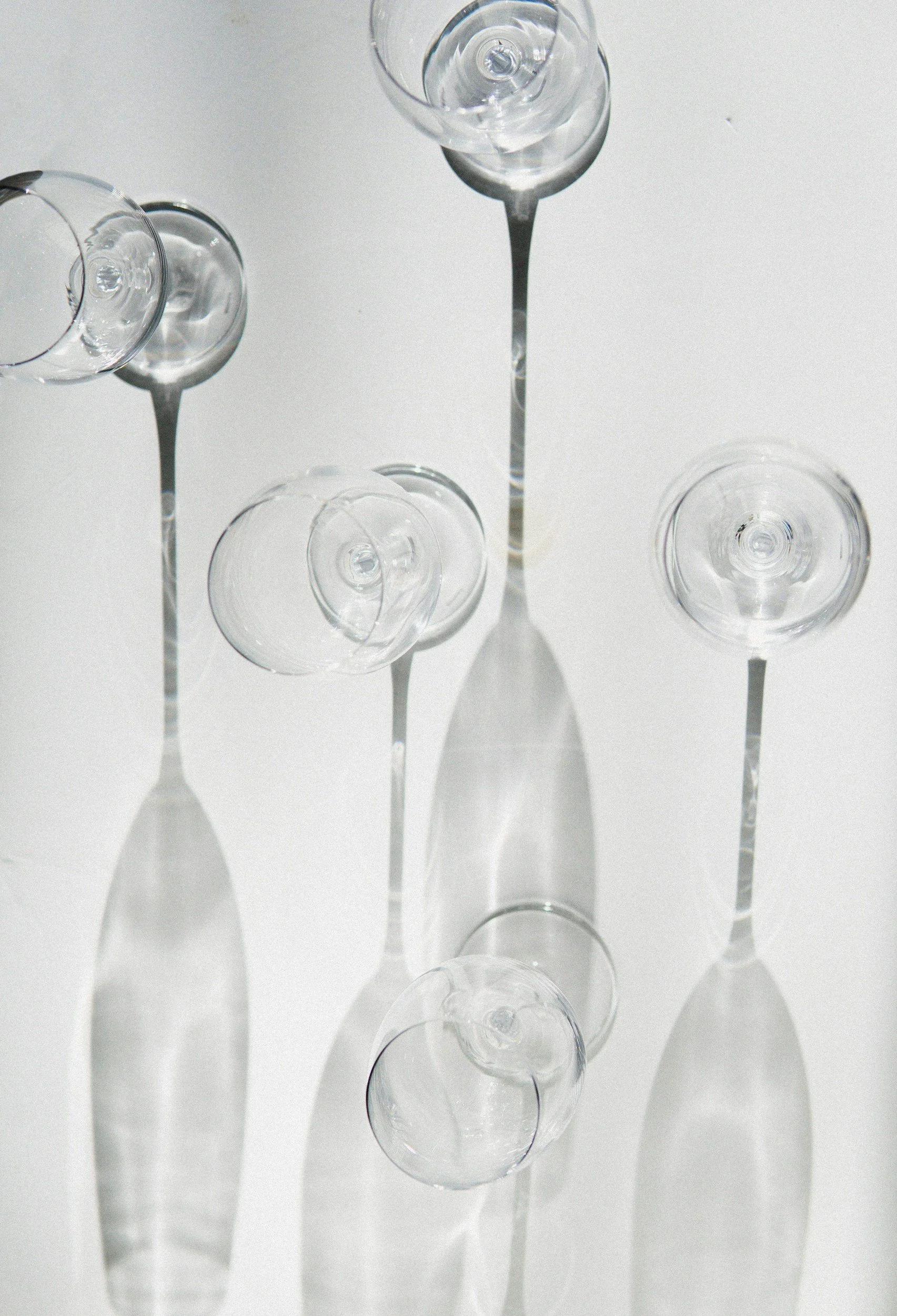 Black and white top down view of empty wineglasses