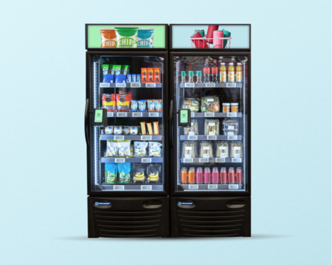 Two vending machines stocked with snacks and drinks, set against a light blue background.