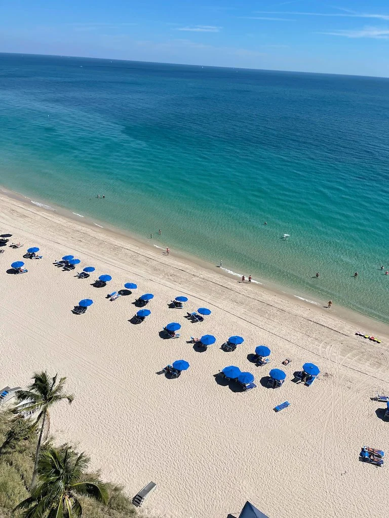 Golden Sunrises &amp; Oceanfront Luxury at Pelican Grand Beach Resort