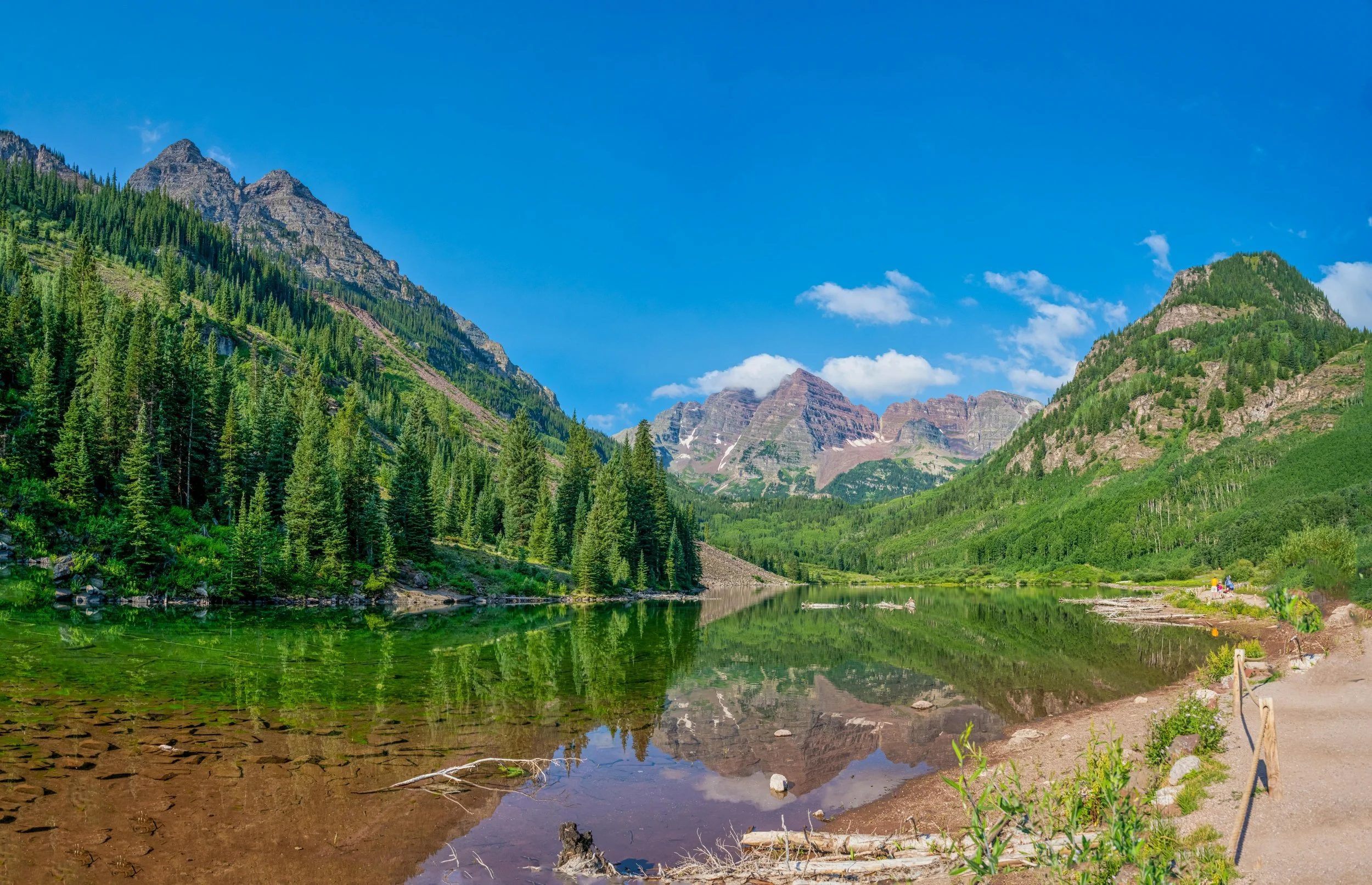 Aspen, CO, United States.  Green Trees Near Lake Under Blue Sky