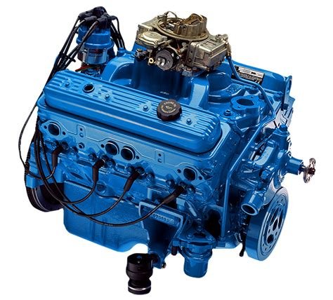 crusader 454/7.4 big block engine with various mechanical components and a  carburetor on top.