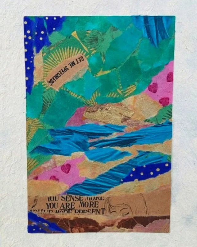 A colorful collage with various painted and torn paper elements. It includes a label that reads 'GET ME SPECIFICLES,' and some text at the bottom that says, 'YOU SENSE MORE YOU ARE MORE,' along with a simple outline of a face.