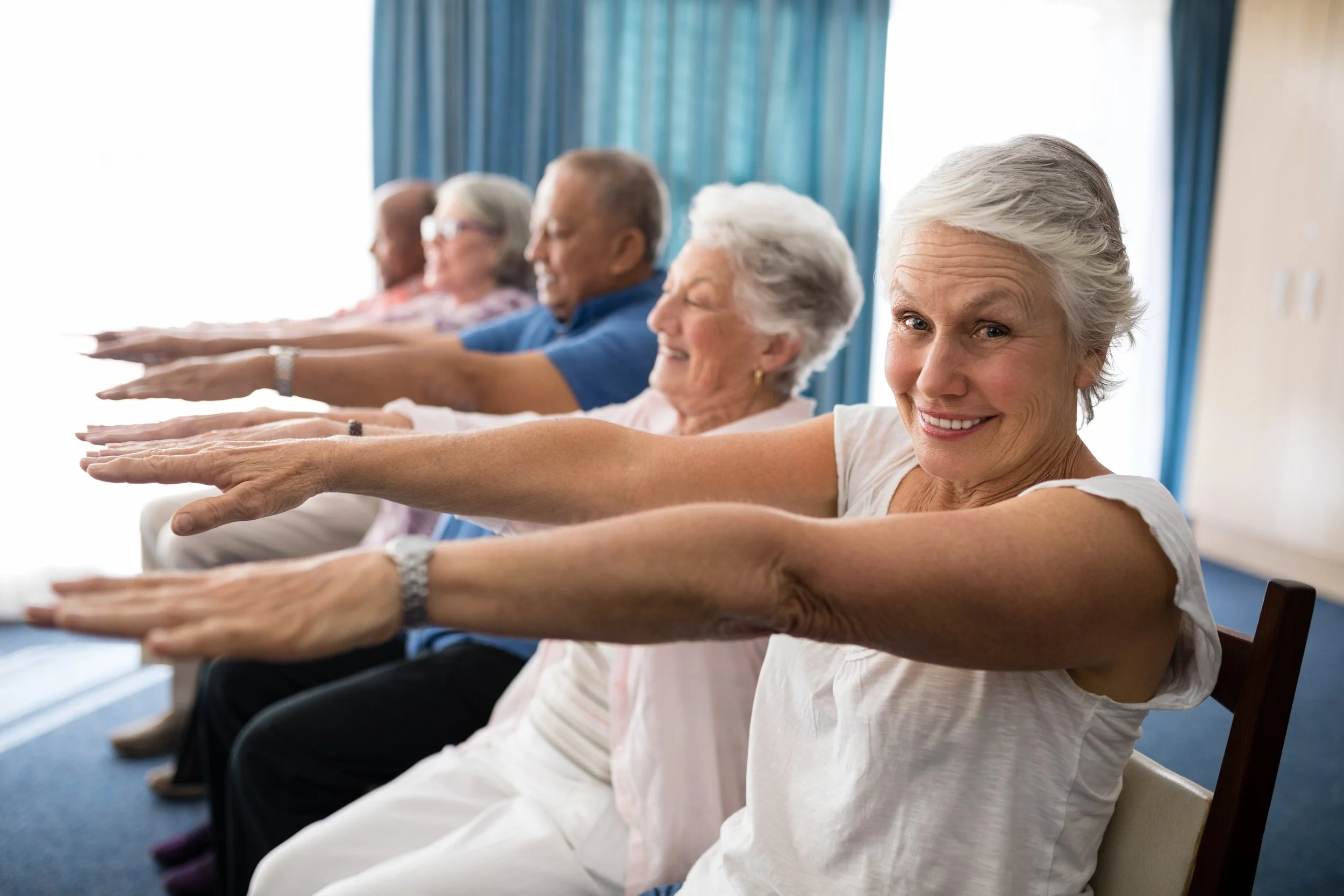 portrait-of-smiling-senior-woman-exercising-with-f-2026-01-11-10-33-15-utc.jpg