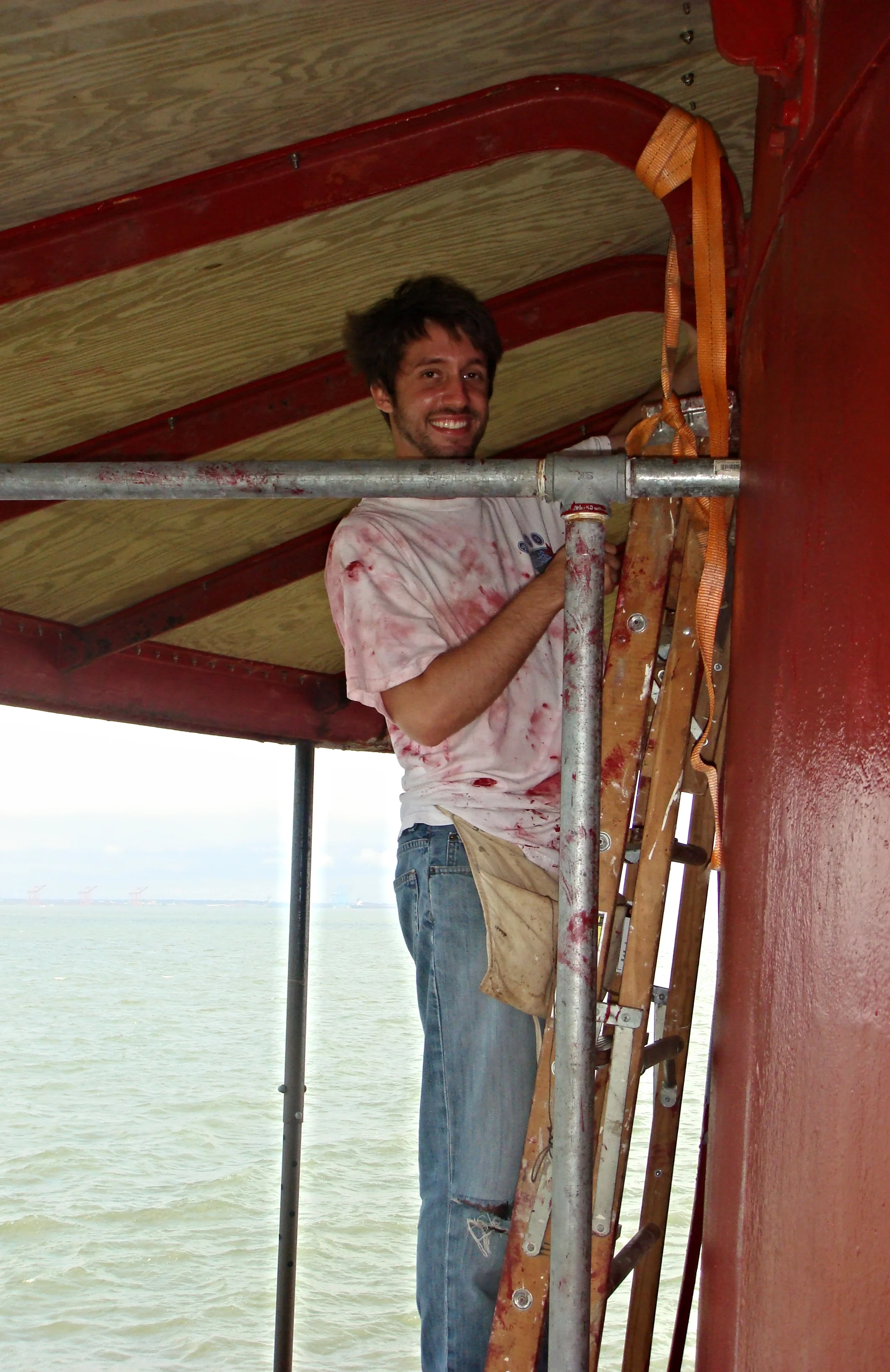 A worker helping to reconstruct some areas of the main deck on Middle Ground Lighthouse. 