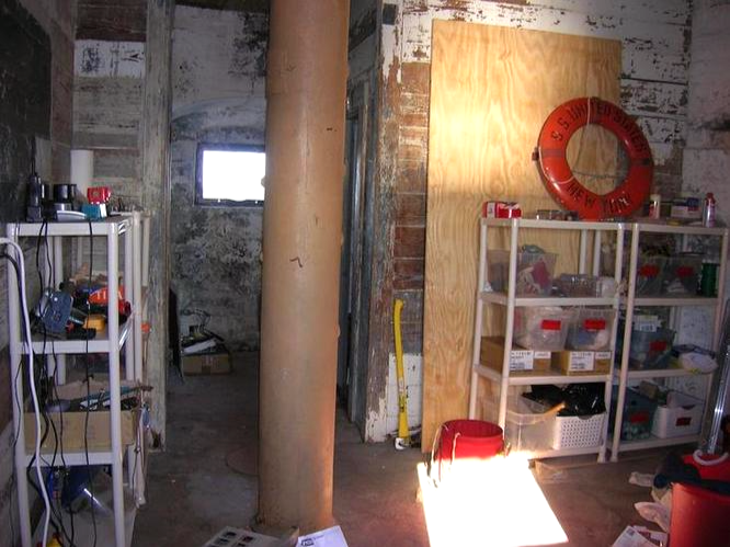 The before photo of the cellar of Middle Ground Lighthouse before its restoration.