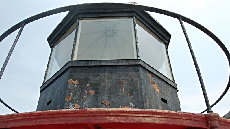 The before photo of the lantern room of Middle Ground Lighthouse before its restoration.