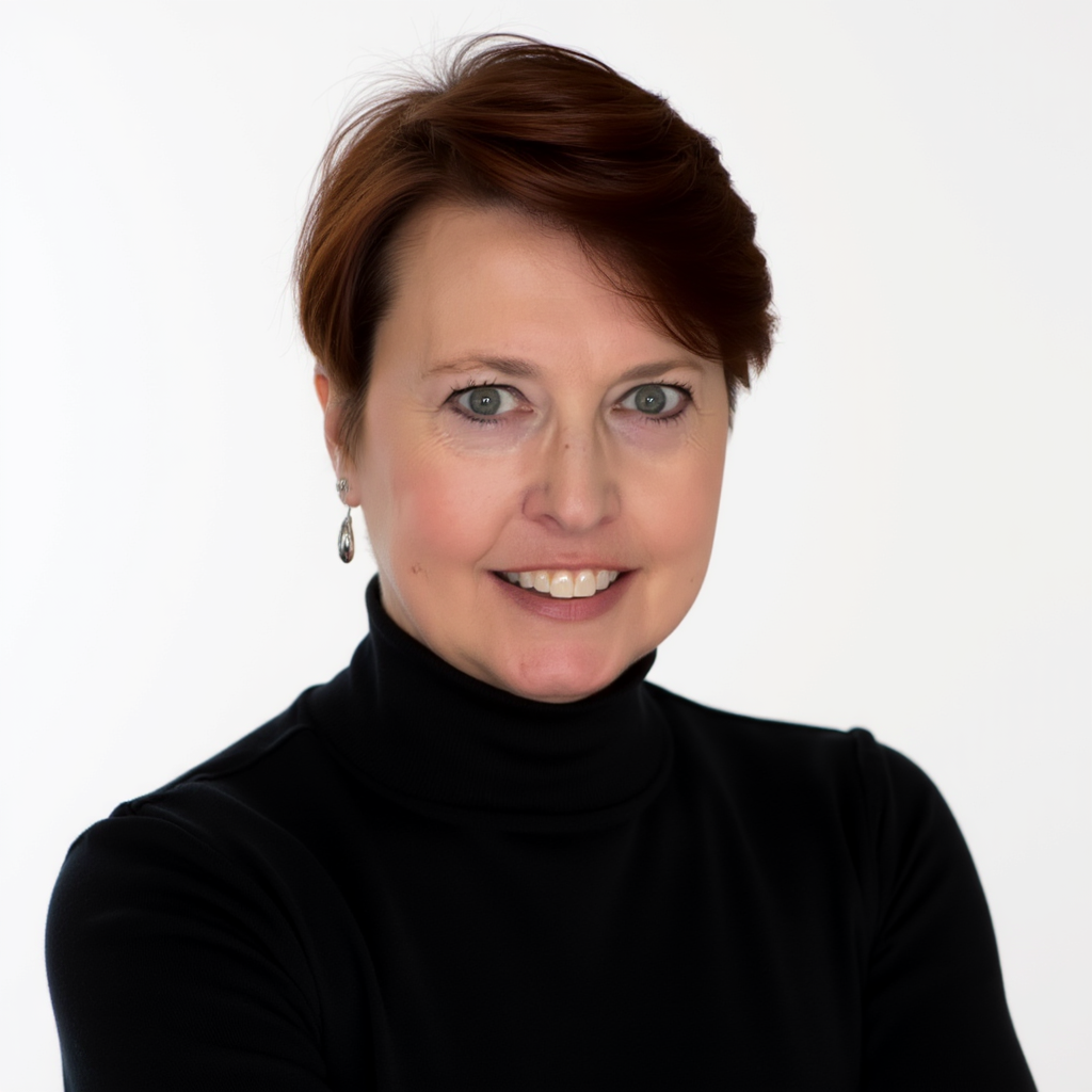 Portrait of a woman with short brown hair wearing a black turtleneck and earrings, smiling against a white background.