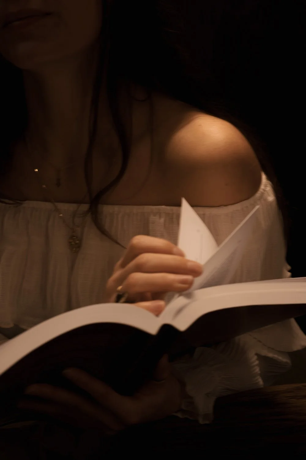 Astrologer researching ancient astrology texts.