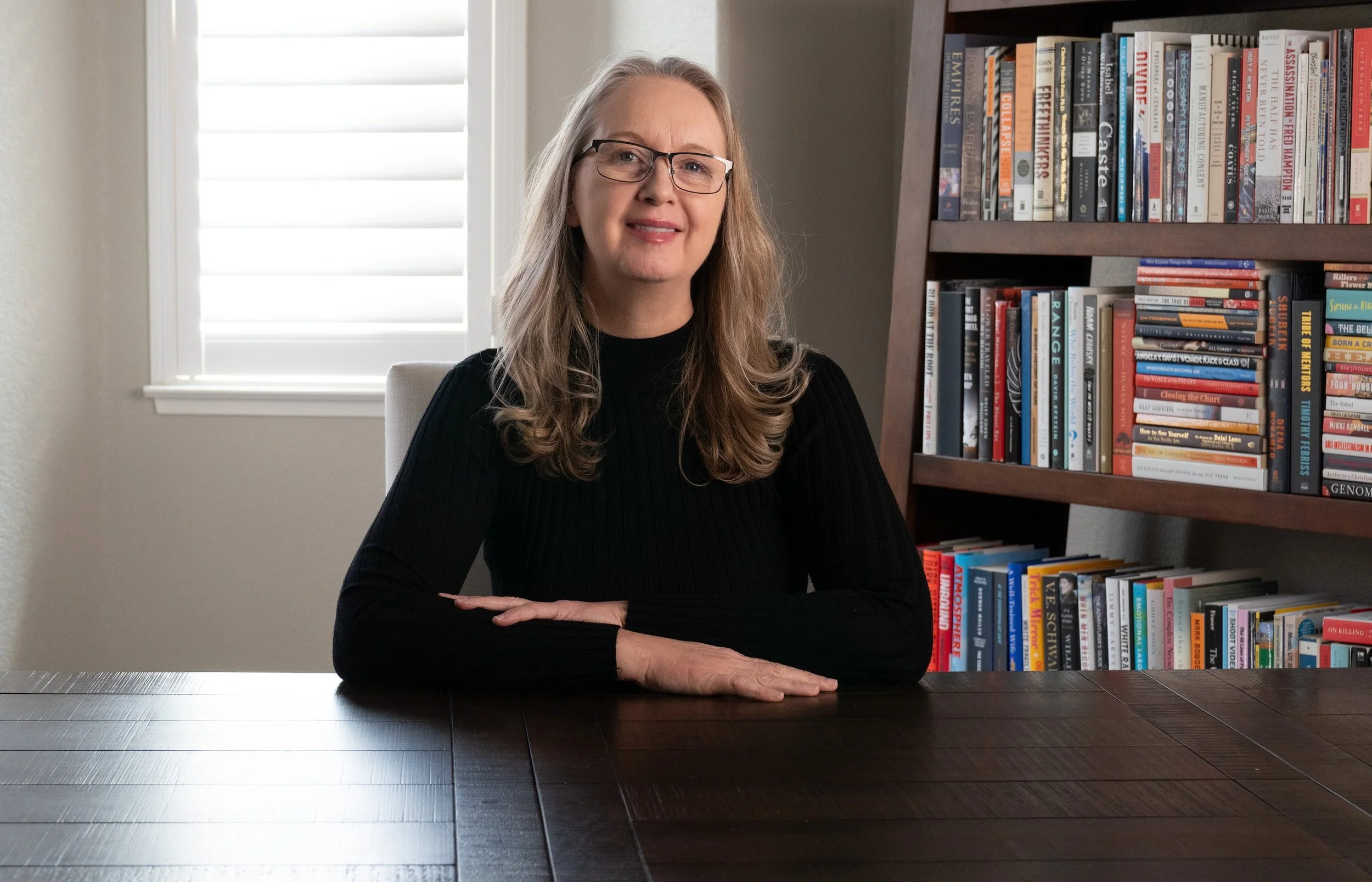Legal Nurse Consultant reviewing medical records to develop a case chronology