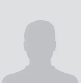 A generic silhouette of a person's head and shoulders against a light gray background.