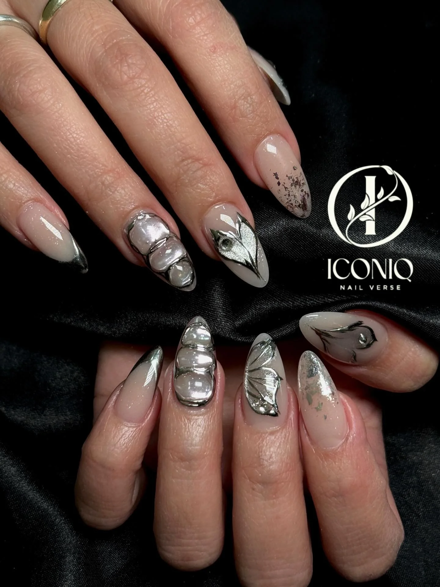 Chrome silver nail design at Iconiq Nail Verse Richmond TX