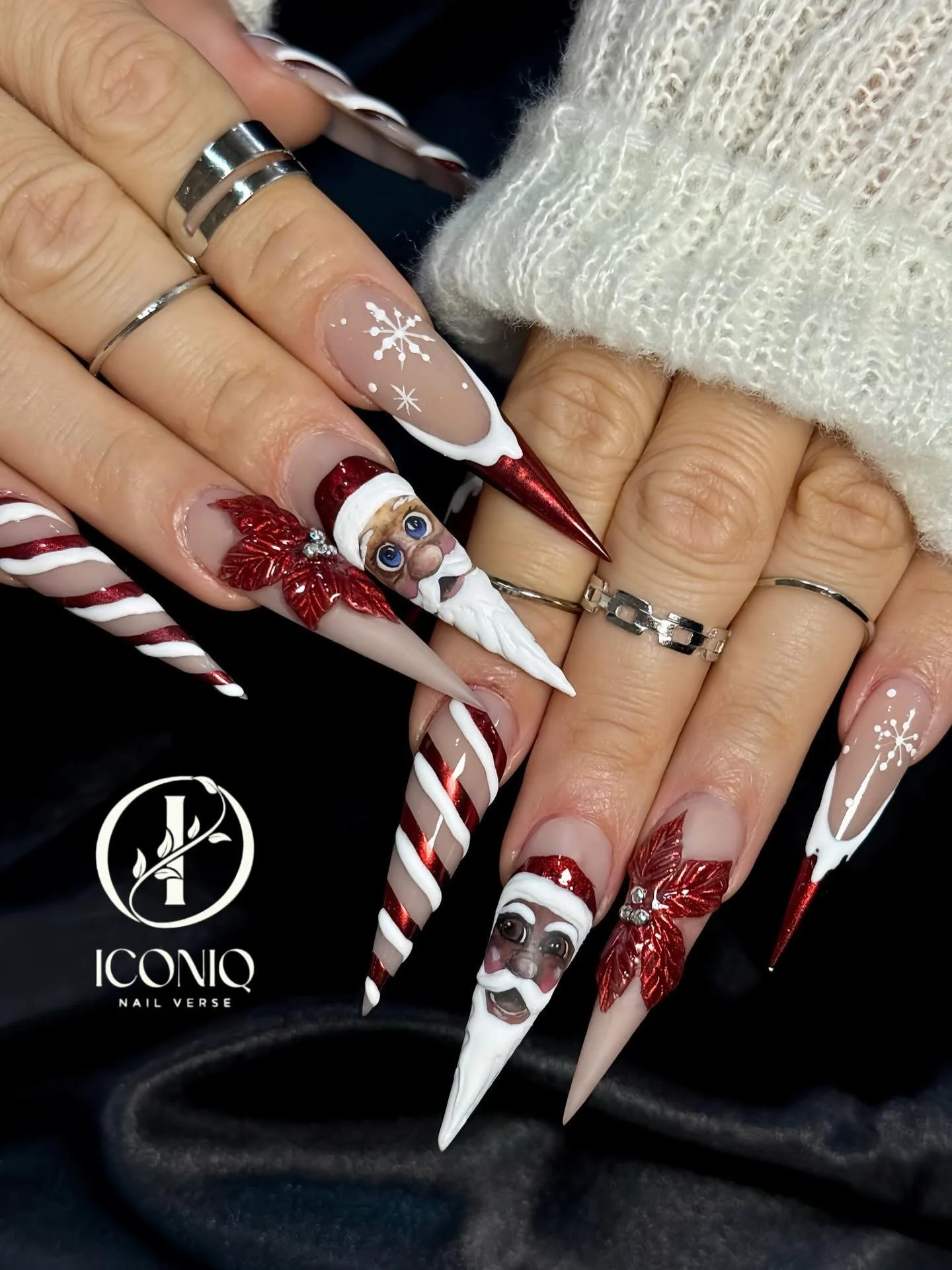 Christmas candy cane Santa 3D nail art with snowflake design at Iconiq Nail Verse Richmond TX