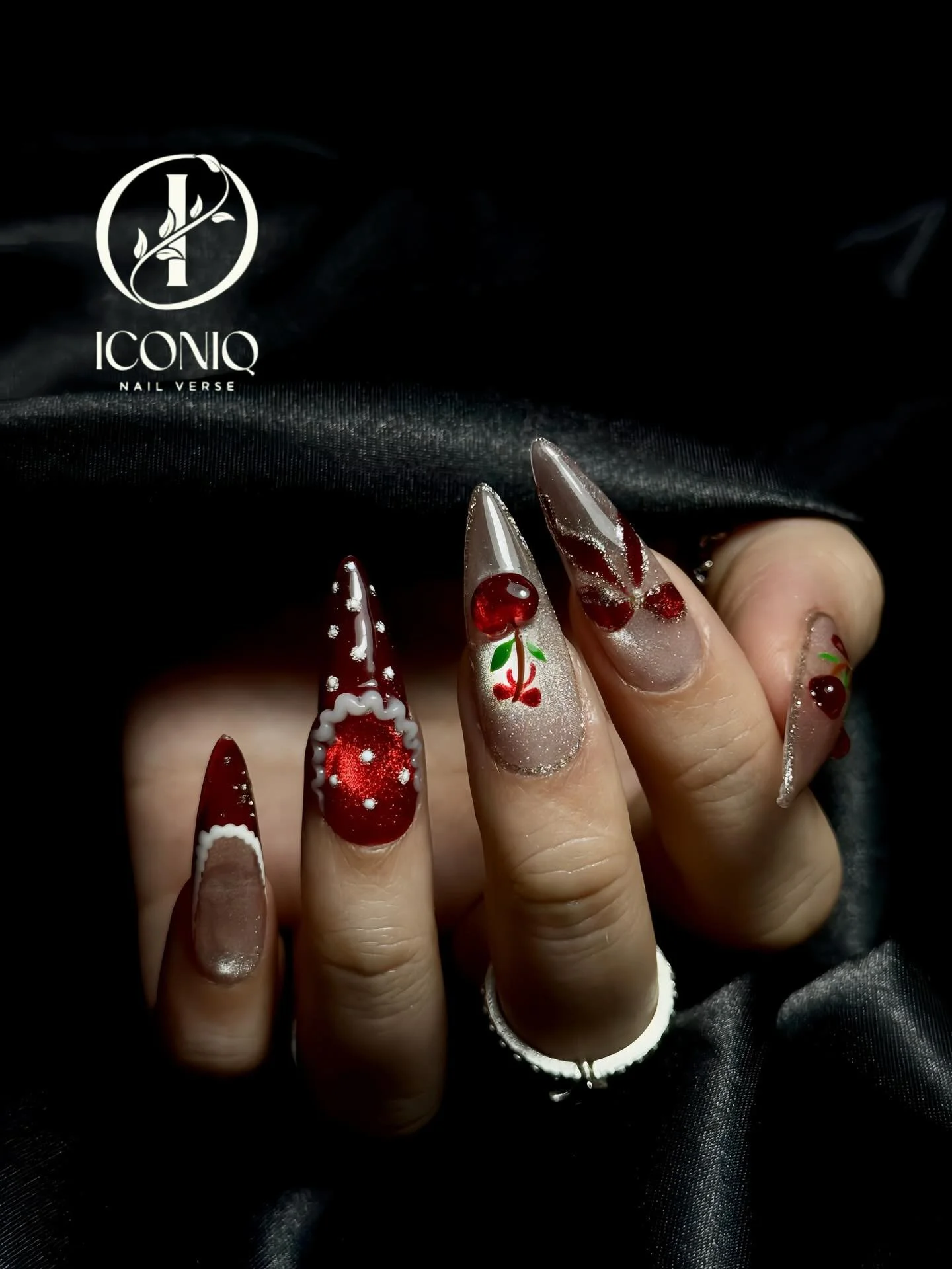 Cherry red holiday stiletto nail art at Iconiq Nail Verse Richmond TX