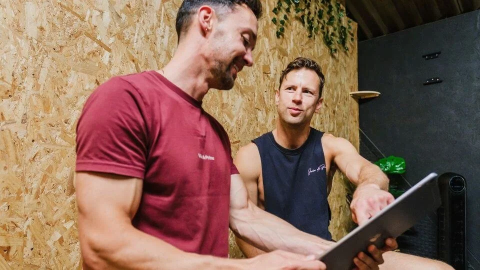 Personal Trainer in Hove constructing initial consultation with new PT client